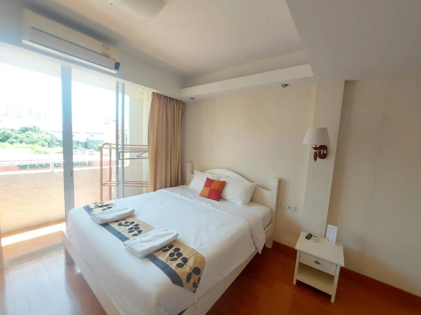 Bed in Grandsmile Wellness Resort