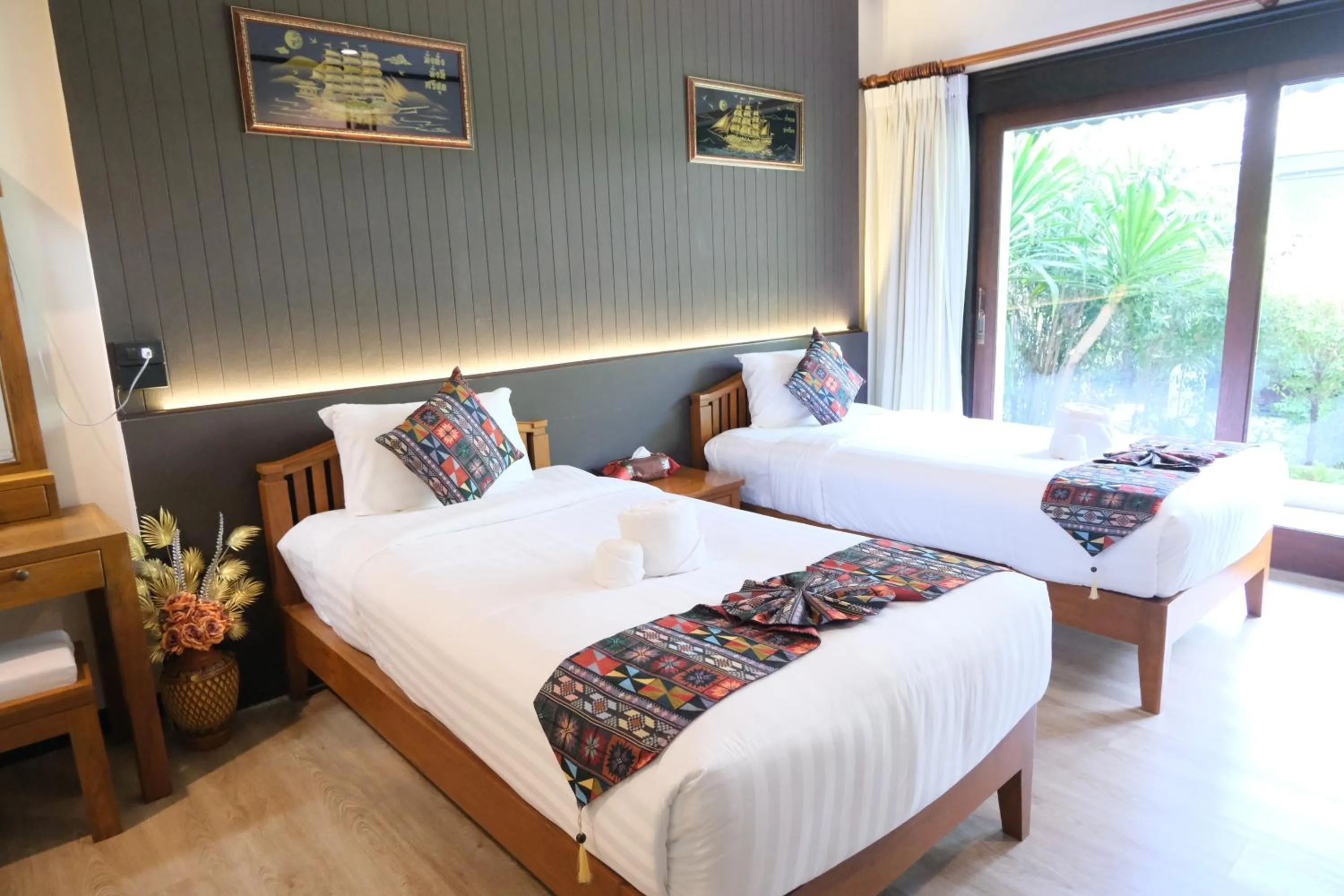 Bed in Vimarn Kaew Village and Resort