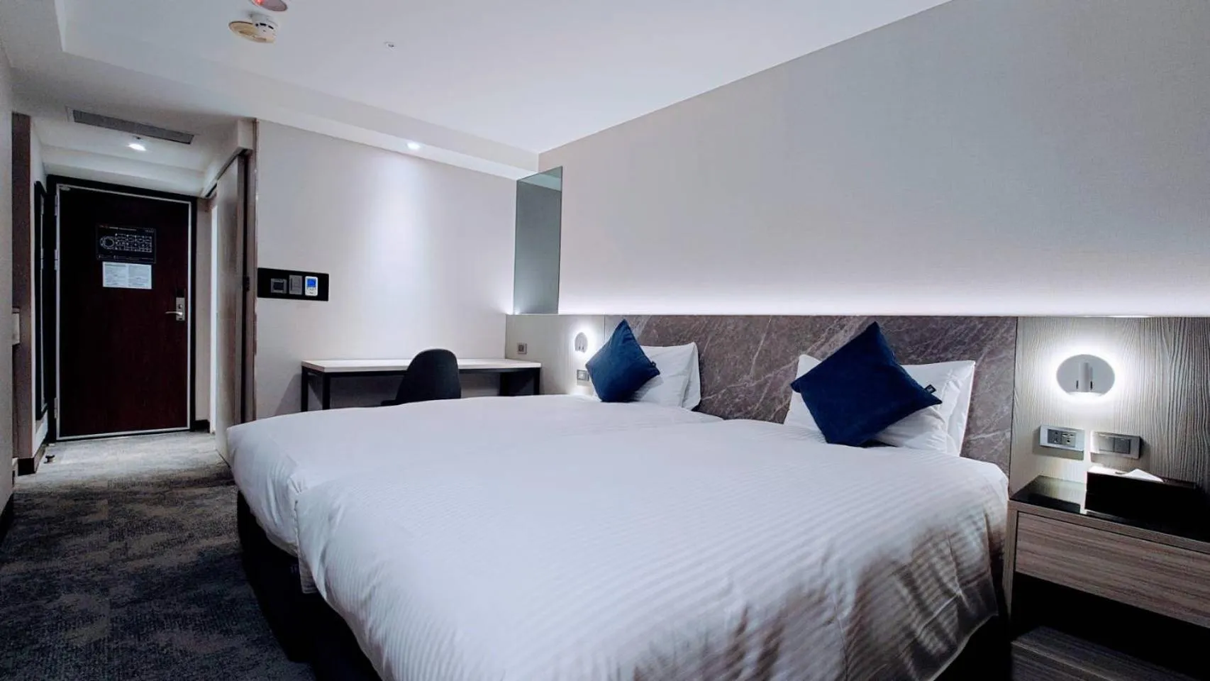 Photo of the whole room, Bed in Hub Hotel Taichung Wenxin