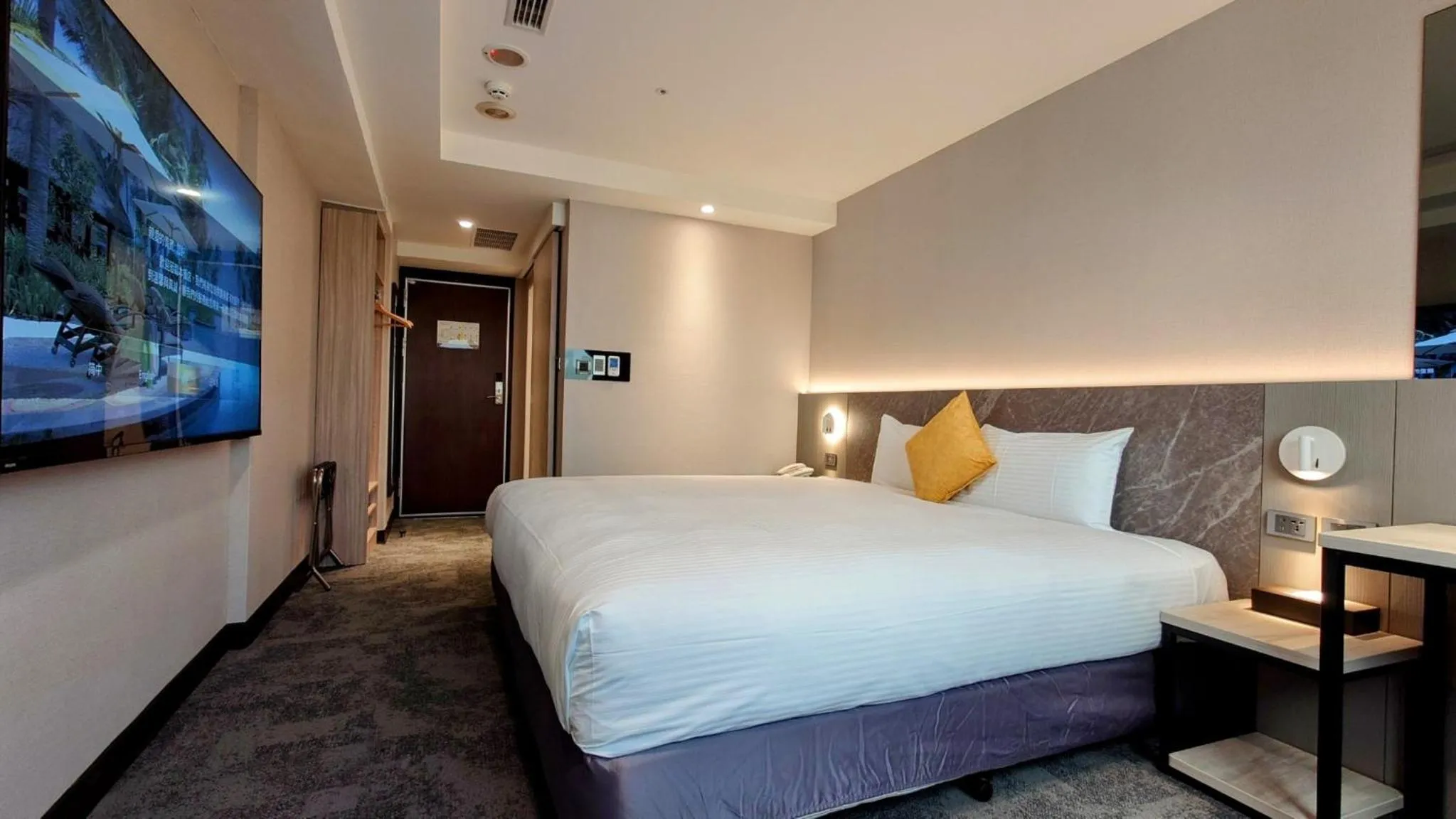 Bed in Hub Hotel Taichung Wenxin
