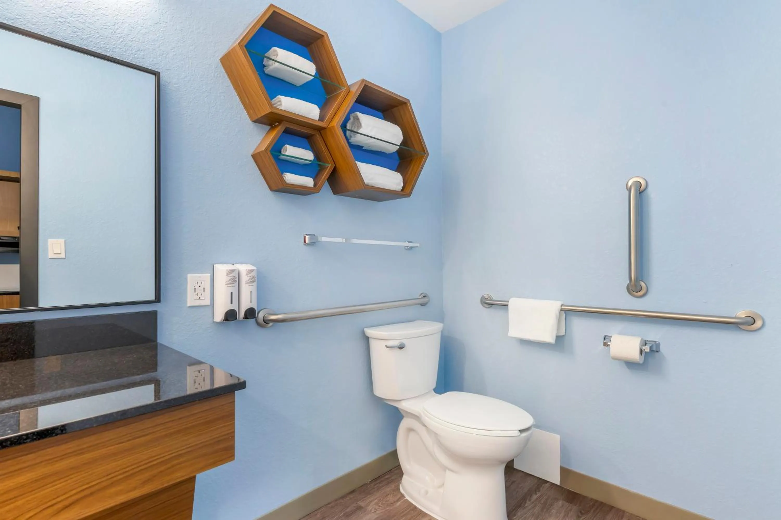 Bathroom in HomeTowne Studios by Red Roof Tampa - Airport