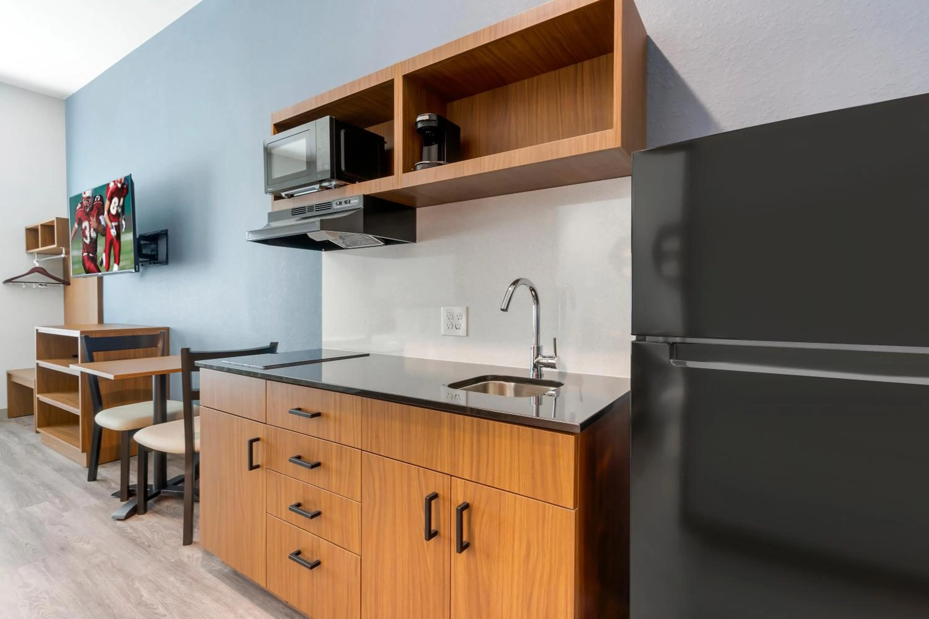 Photo of the whole room in HomeTowne Studios by Red Roof Tampa - Airport