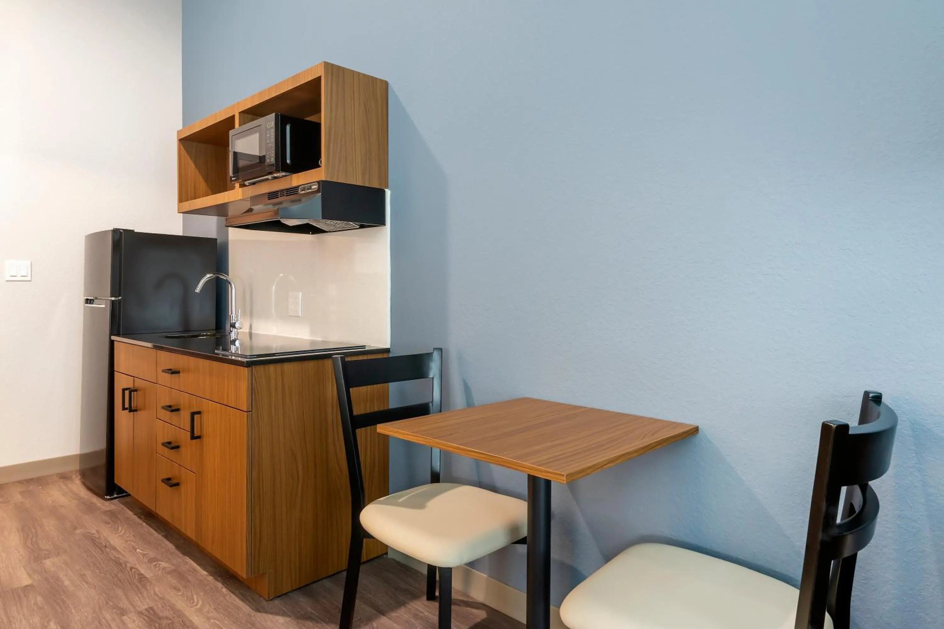 Photo of the whole room in HomeTowne Studios by Red Roof Tampa - Airport