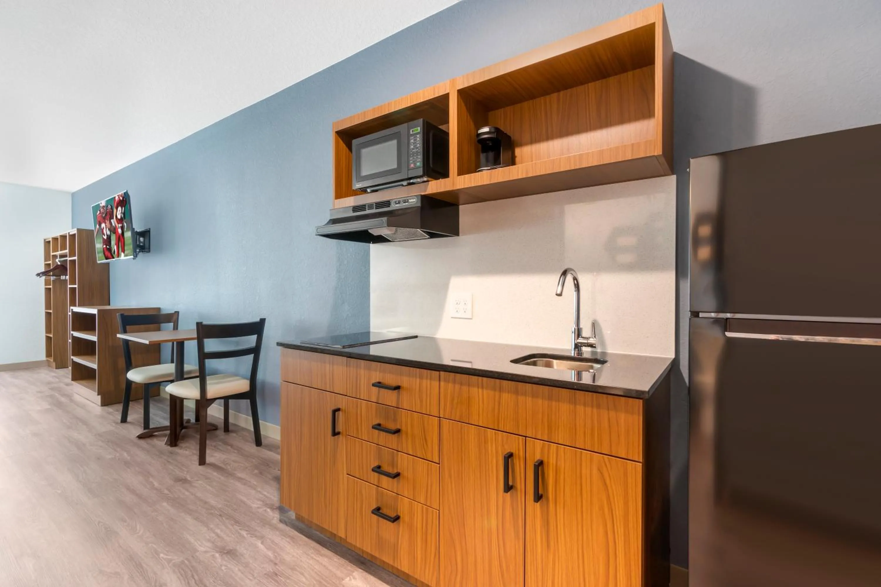 Photo of the whole room in HomeTowne Studios by Red Roof Tampa - Airport