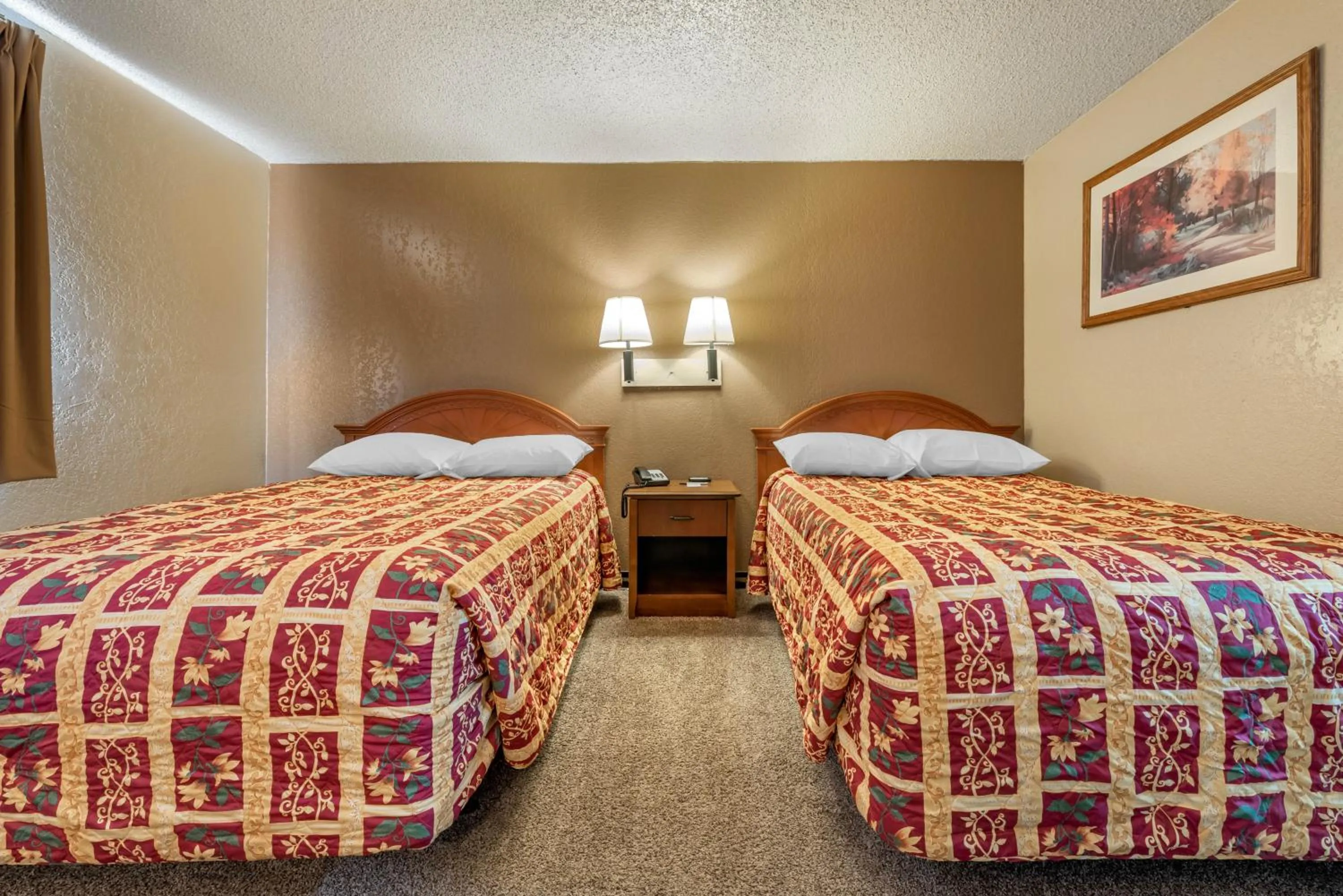 Bed in Pueblo Inn