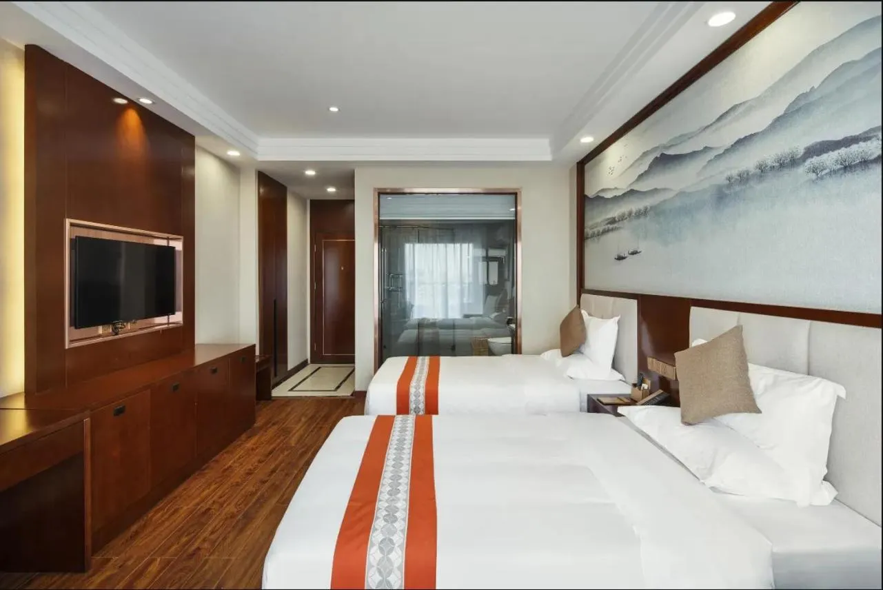 Bed in Rose Garden International Hotel