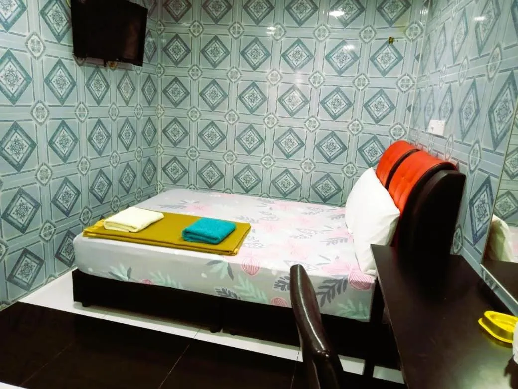 Bed in Kuala Selangor Hotel