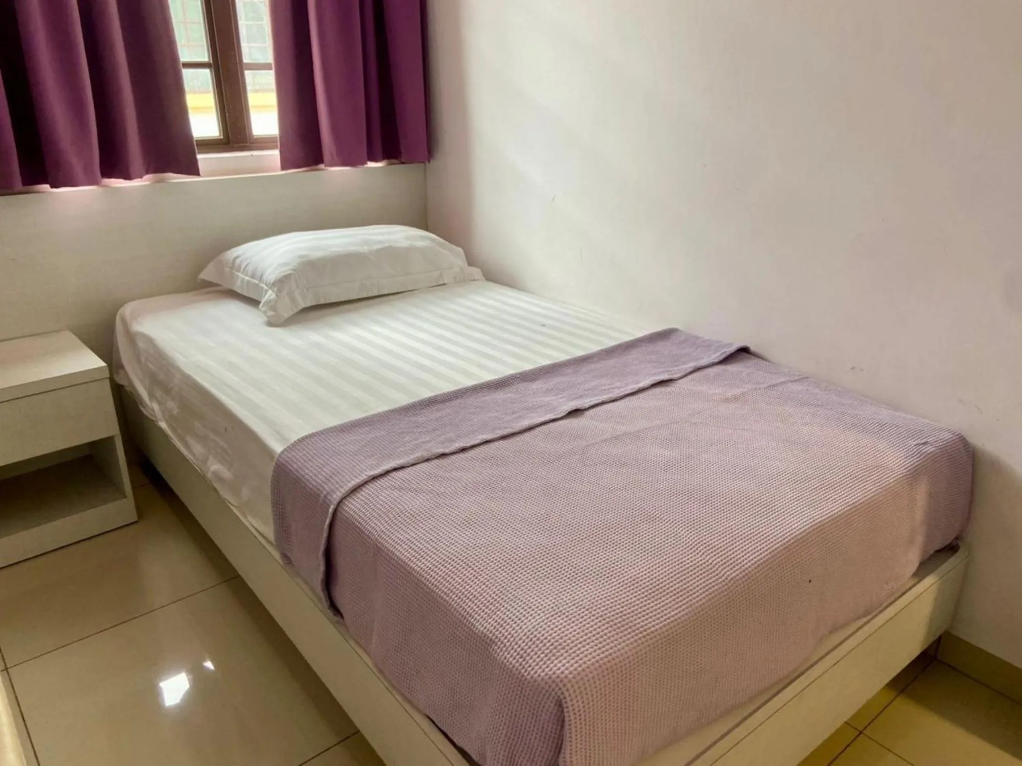 Bed in Lavender Riverside Hotel