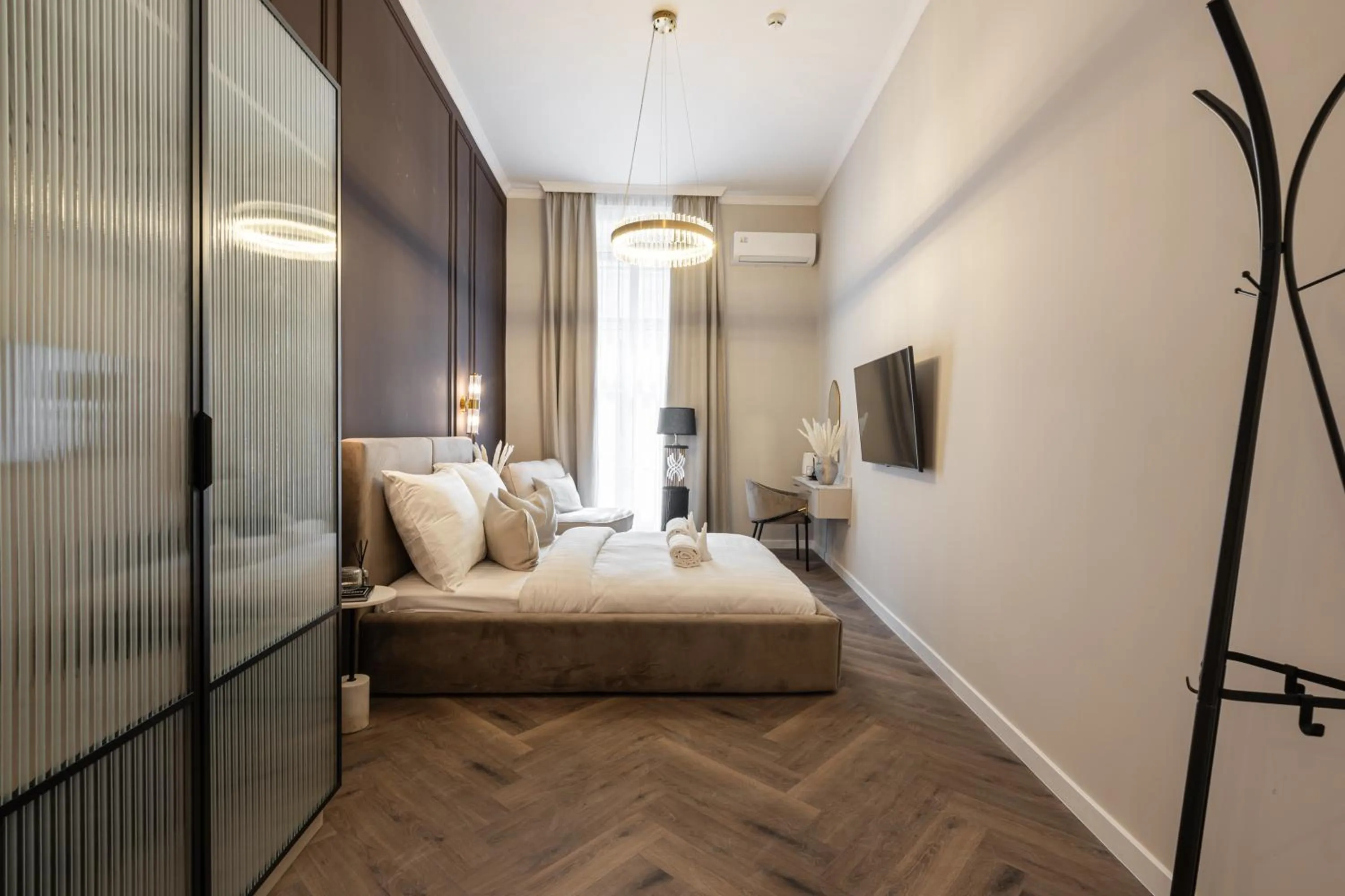 Bed in Timeless Boutique Suites by BQA