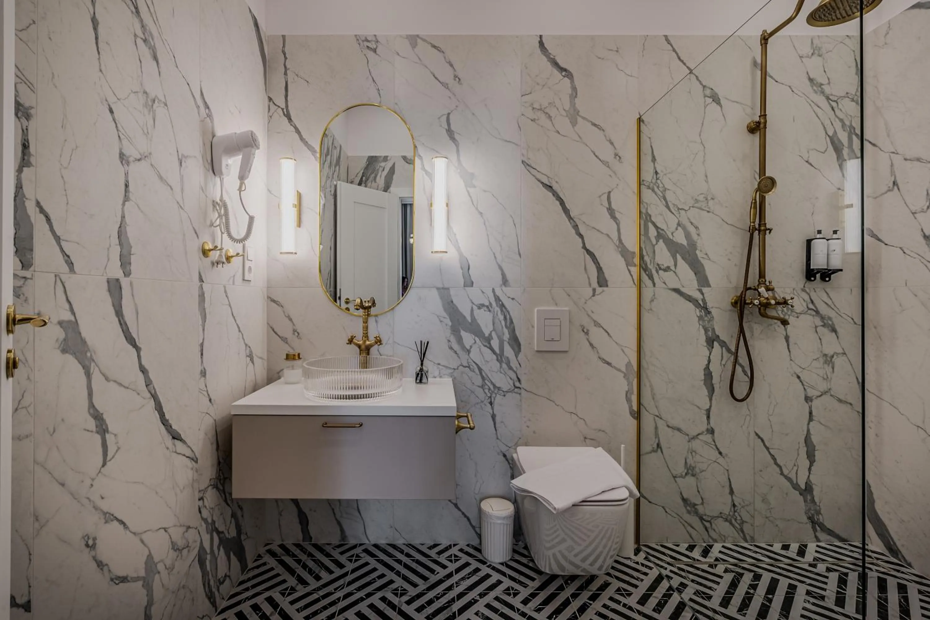 Shower in Timeless Boutique Suites by BQA