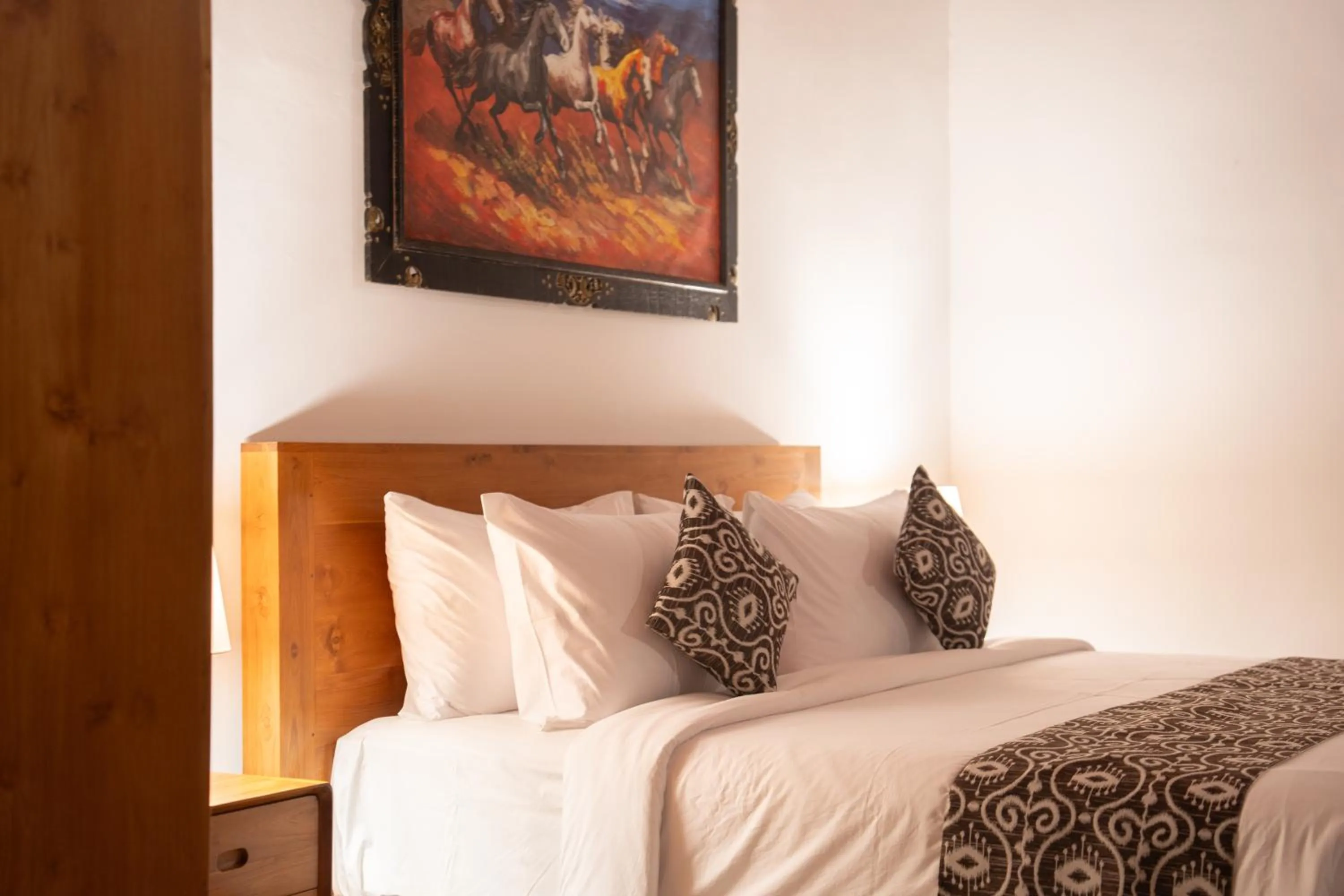 Bed in Kaki Uma Villa