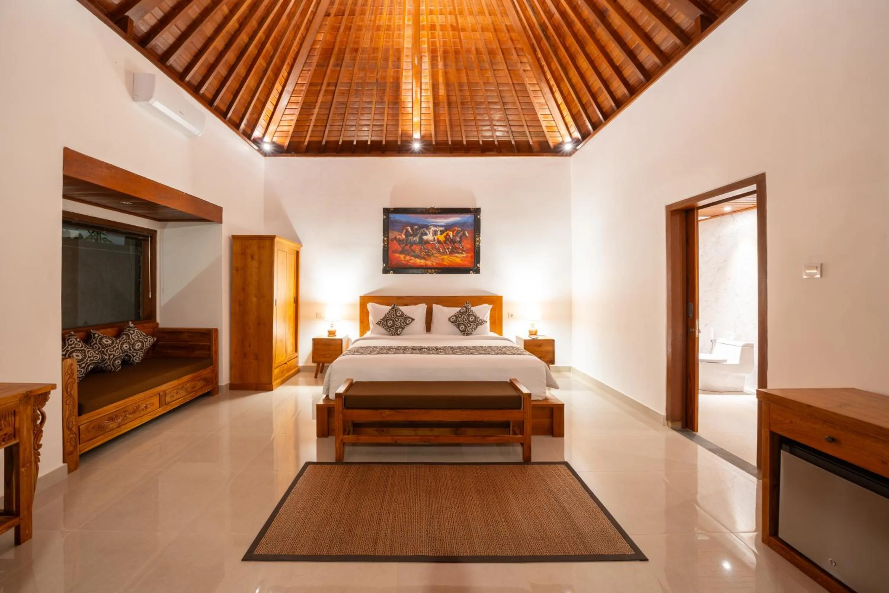 Bed in Kaki Uma Villa