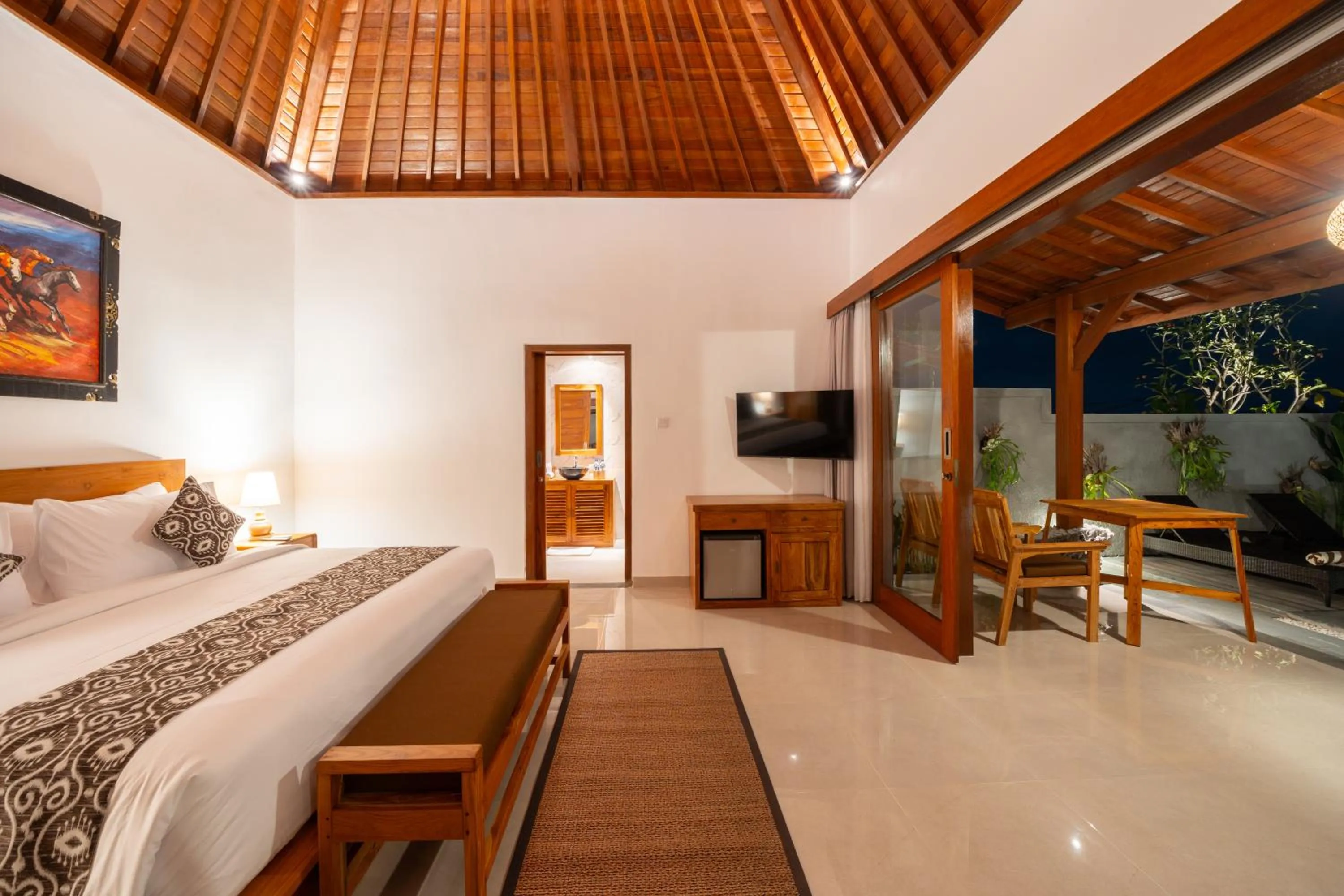 Bed in Kaki Uma Villa