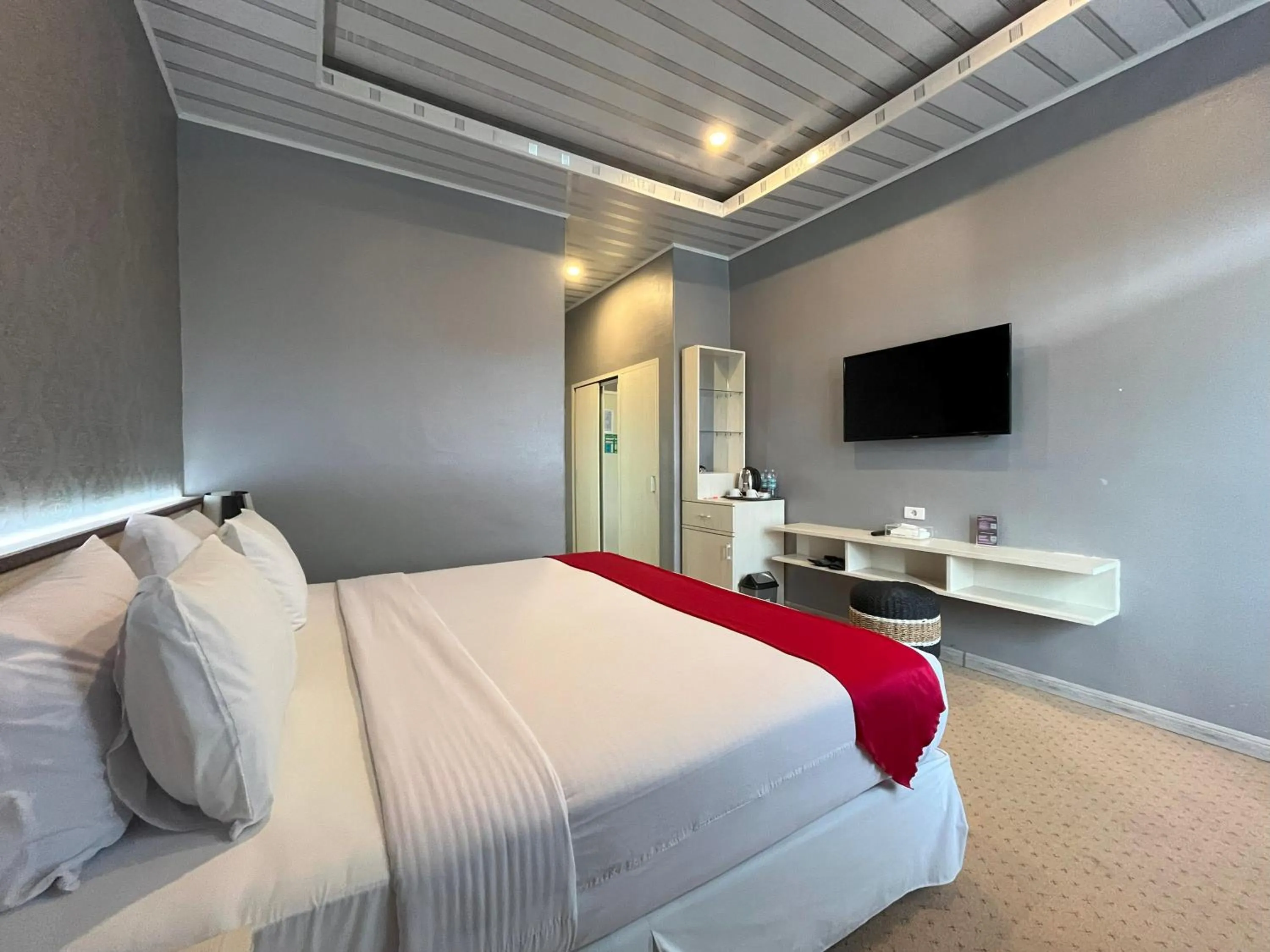 Bed in Grand Tamaro Hotel