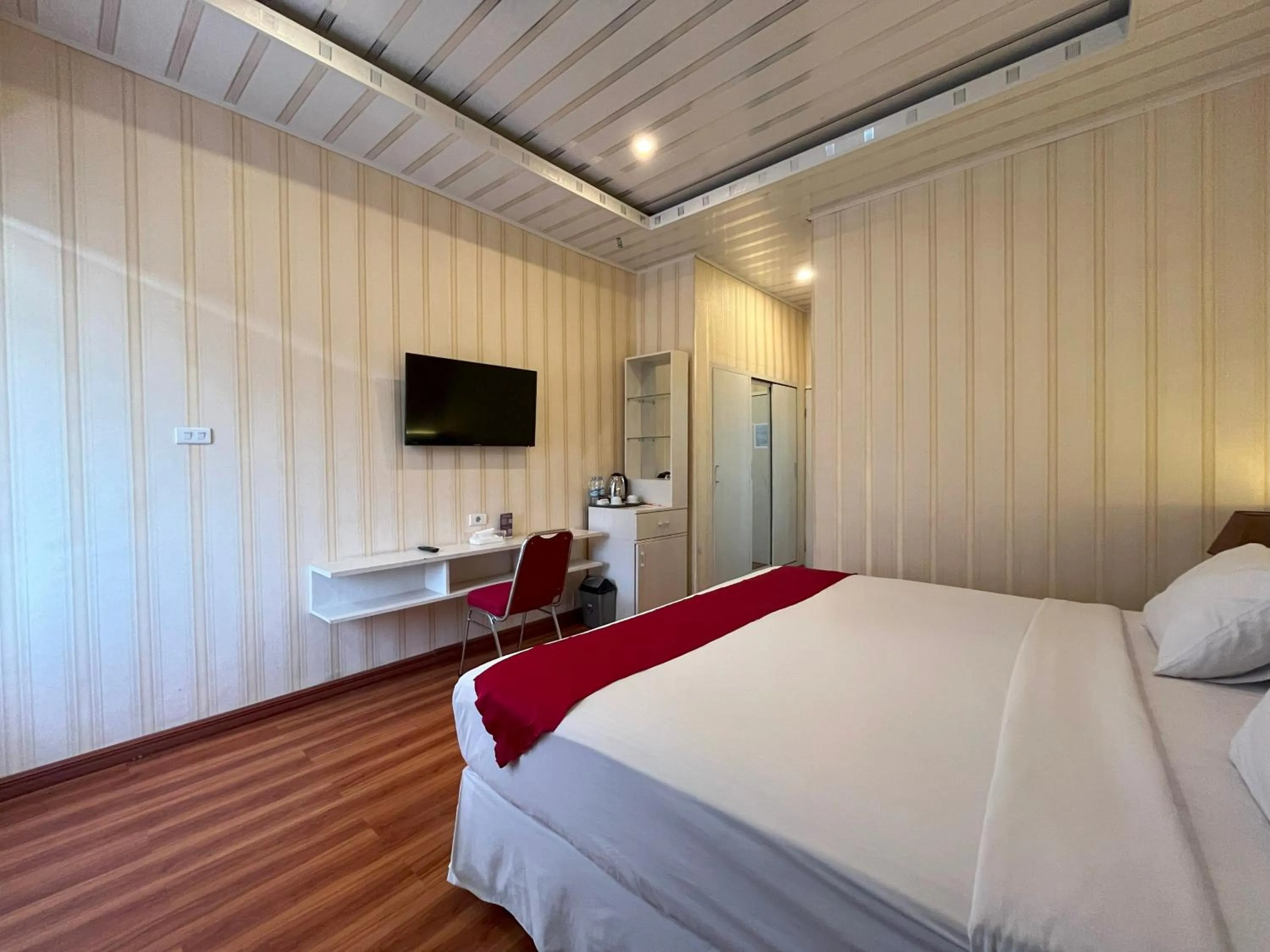 Bed in Grand Tamaro Hotel