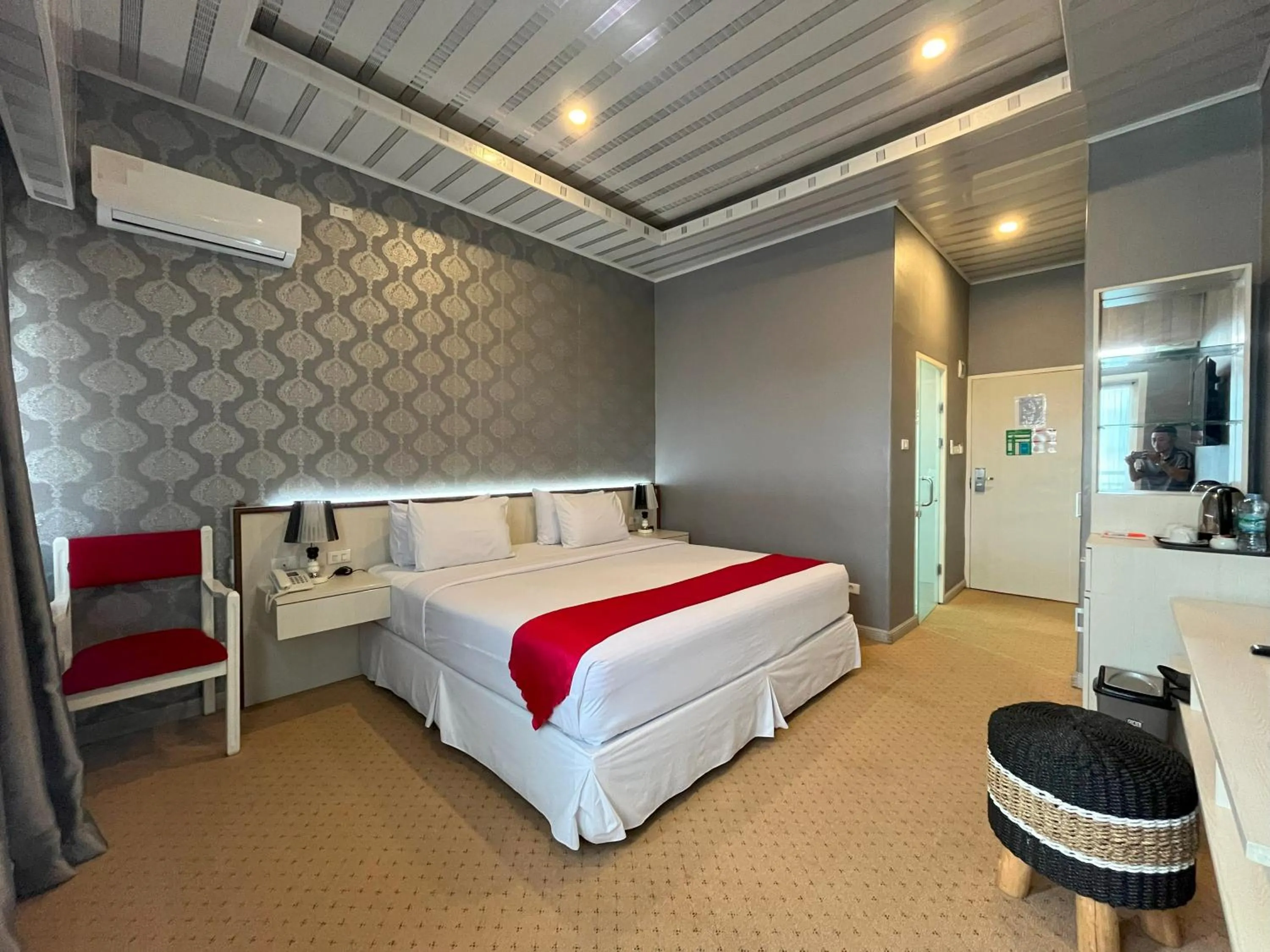 Bed in Grand Tamaro Hotel