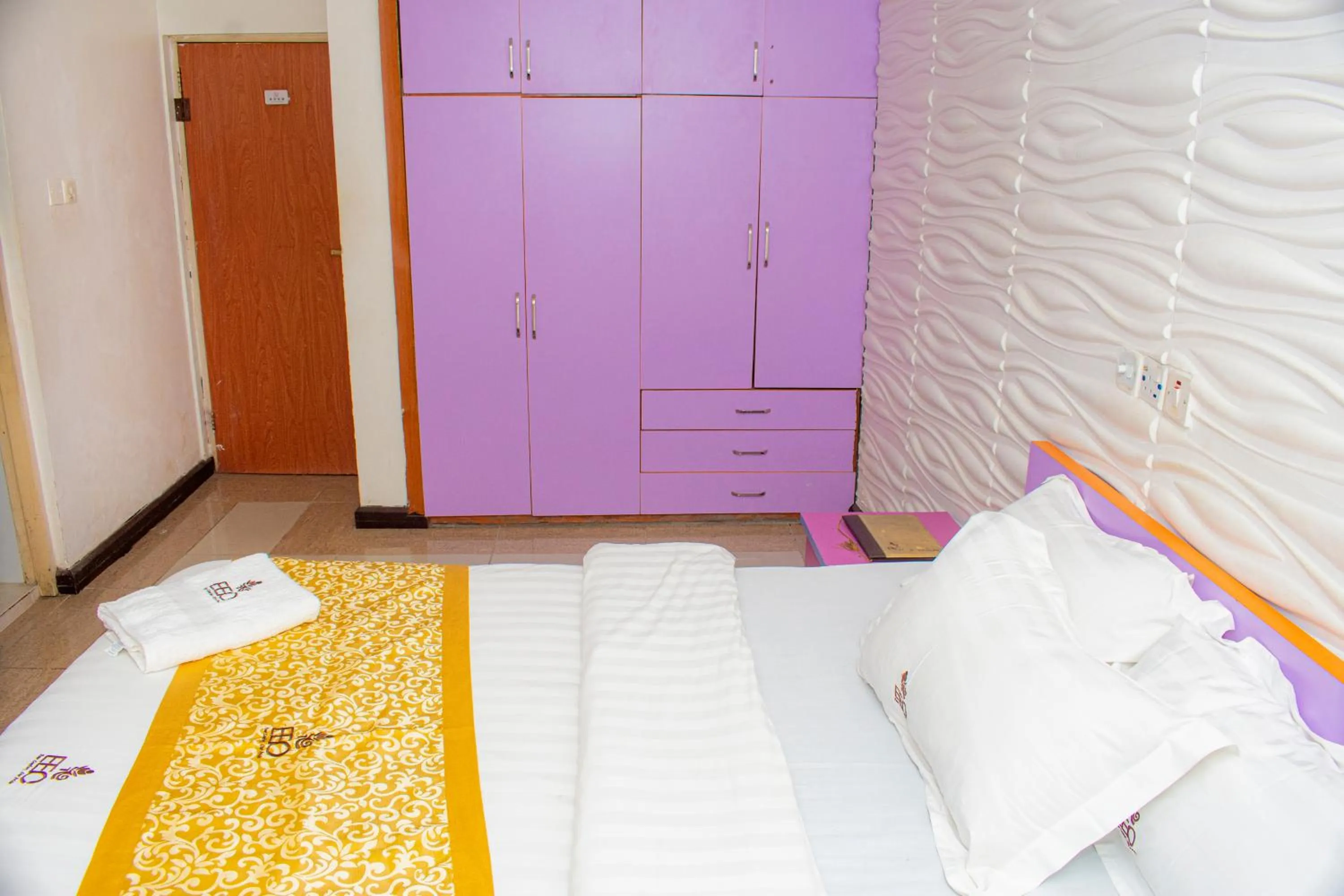 Bed in EED Pension Boutique Hotel