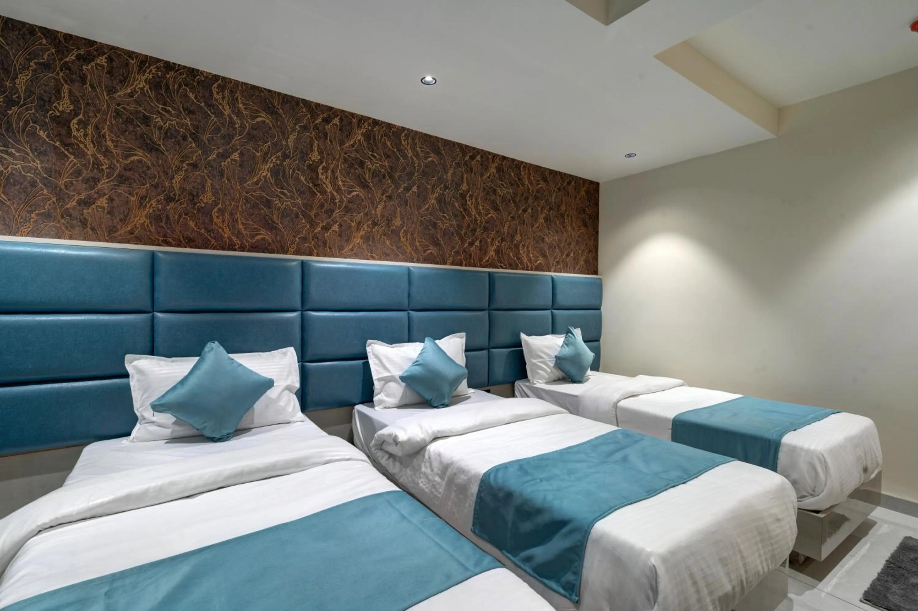 Bed in Hotel Shrimad Villa Gandhinagar