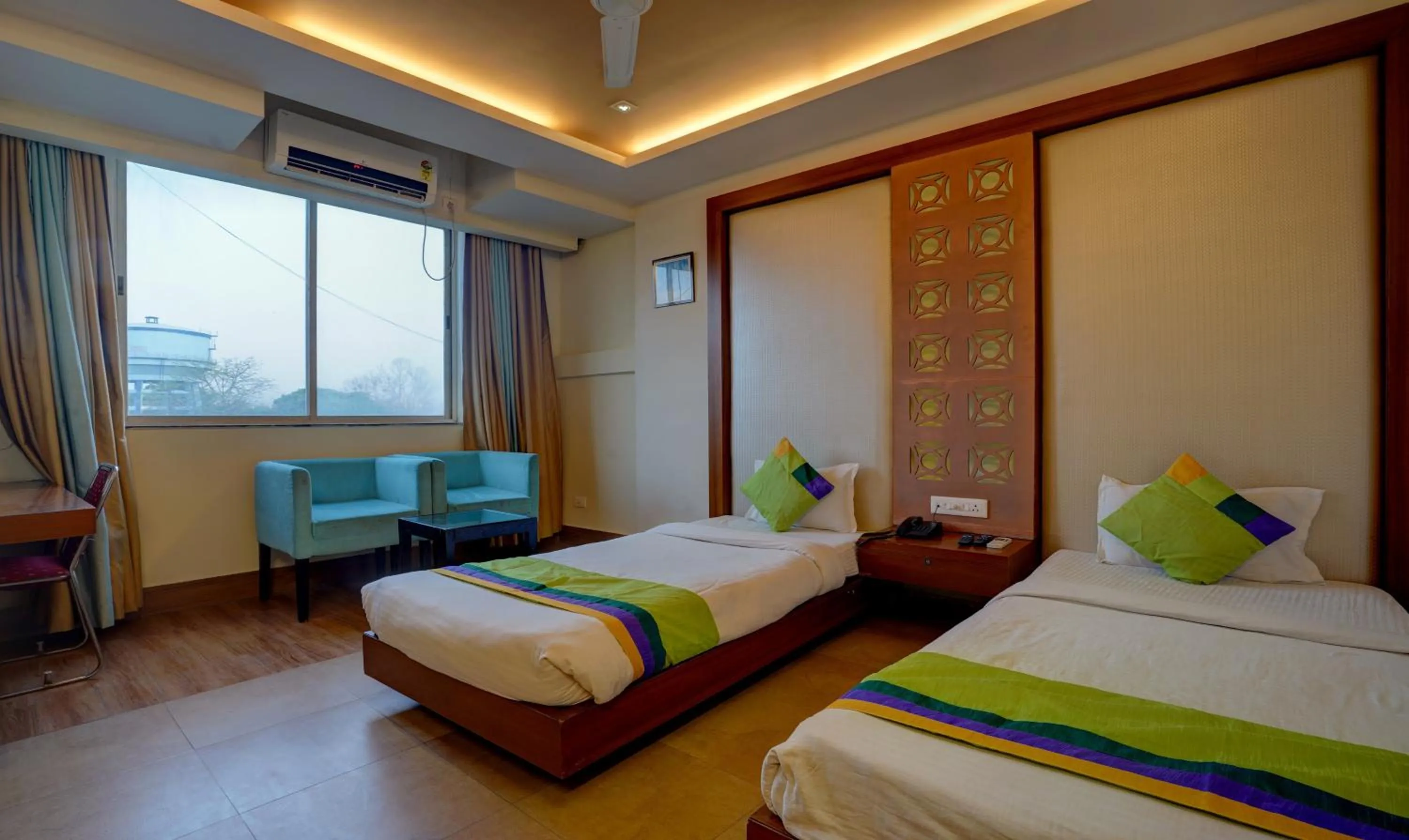 Bedroom, Bed in Treebo B&B