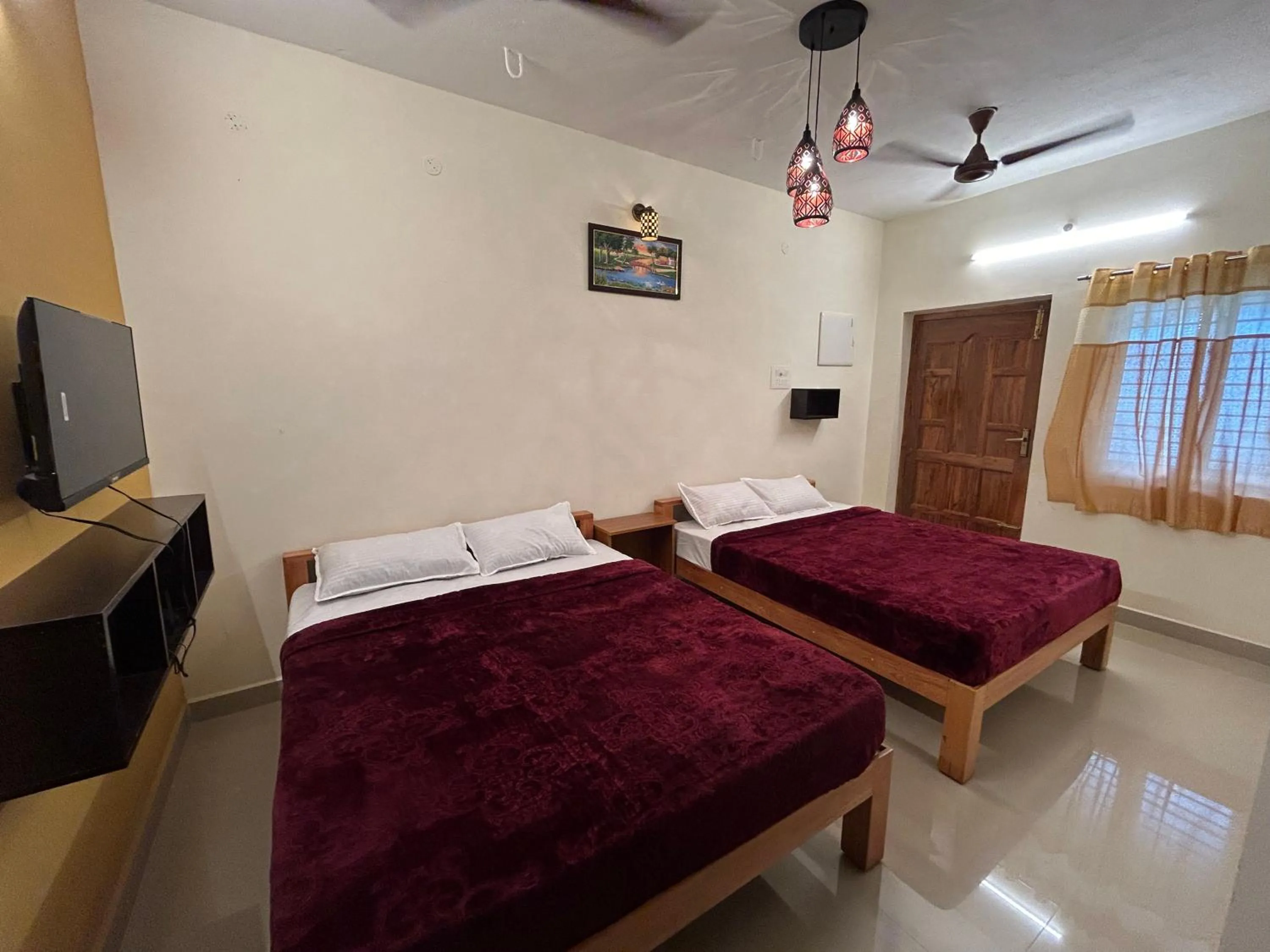 Bed in Aarudra's Residency Srirangam