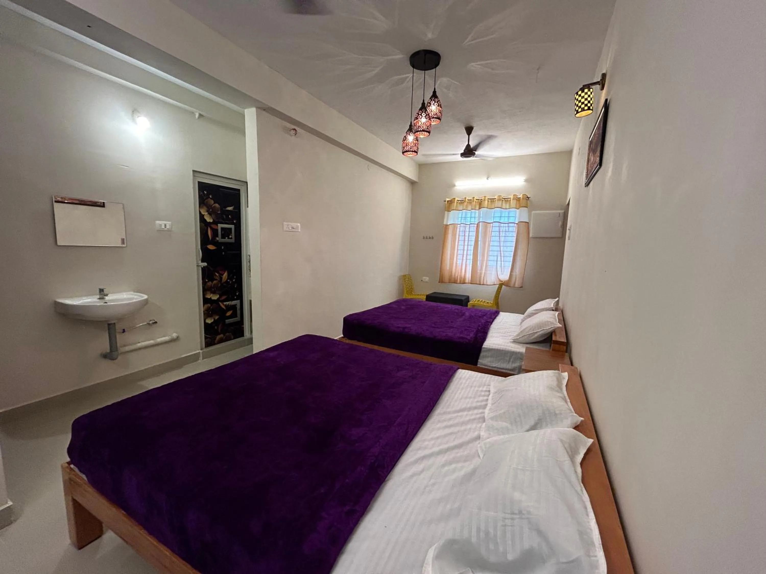 Bed in Aarudra's Residency Srirangam