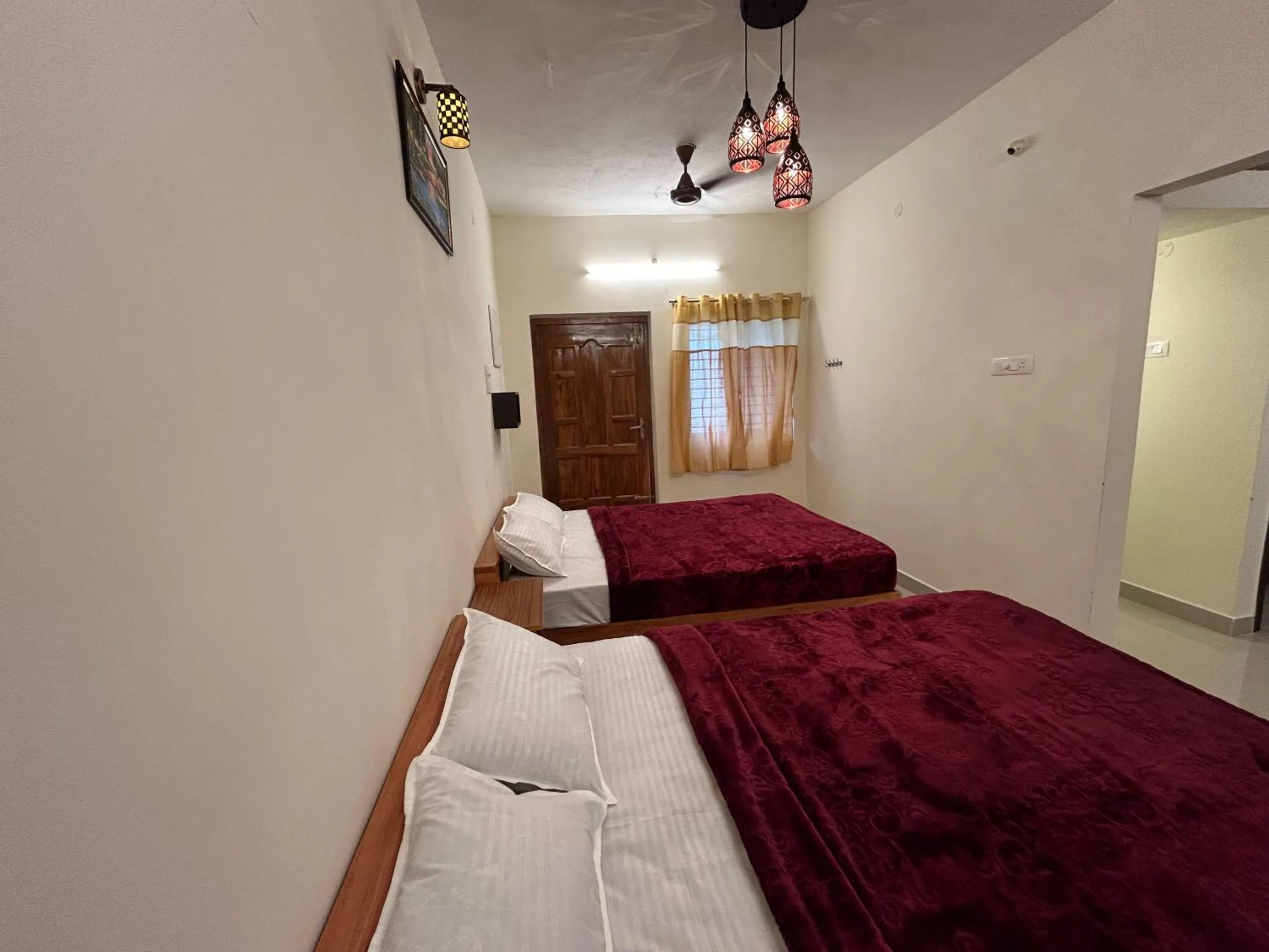 Bed in Aarudra's Residency Srirangam