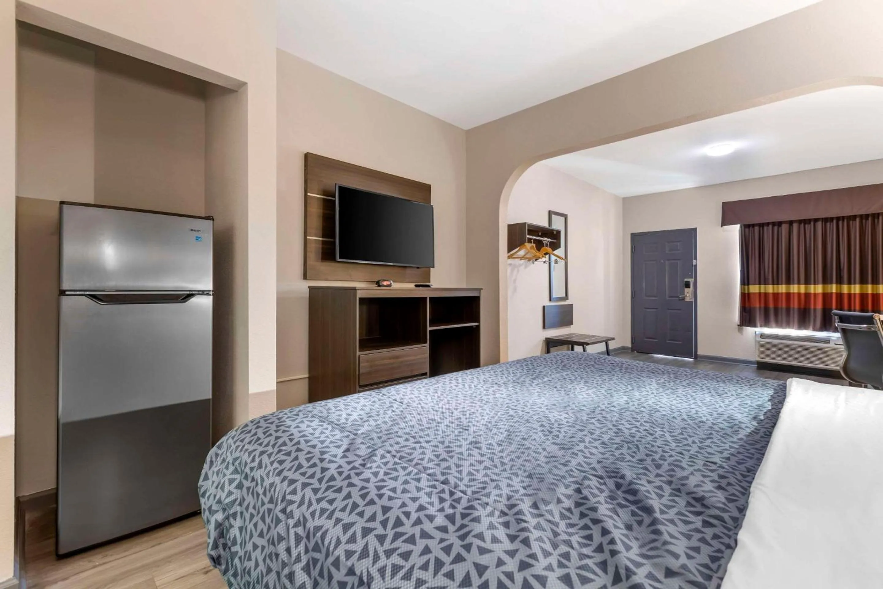 Bedroom, Bed in Suburban Studios Orangeburg