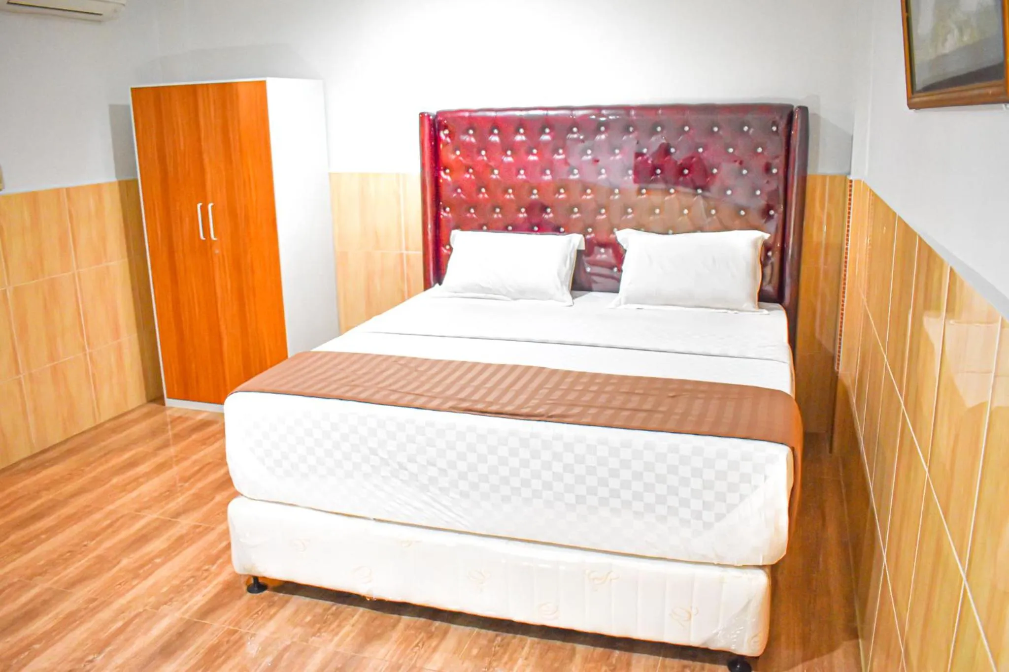 Bed in Hotel Grand Bandara