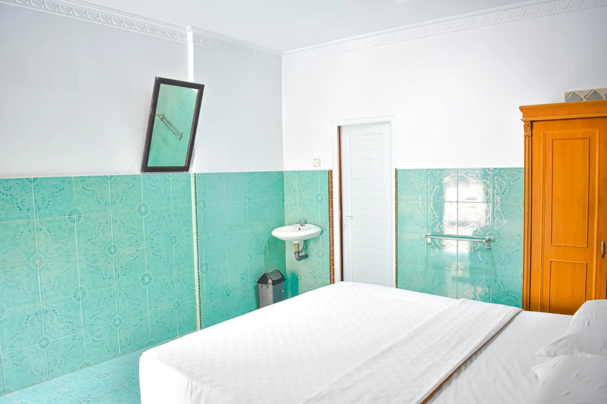 Bed in Hotel Grand Bandara