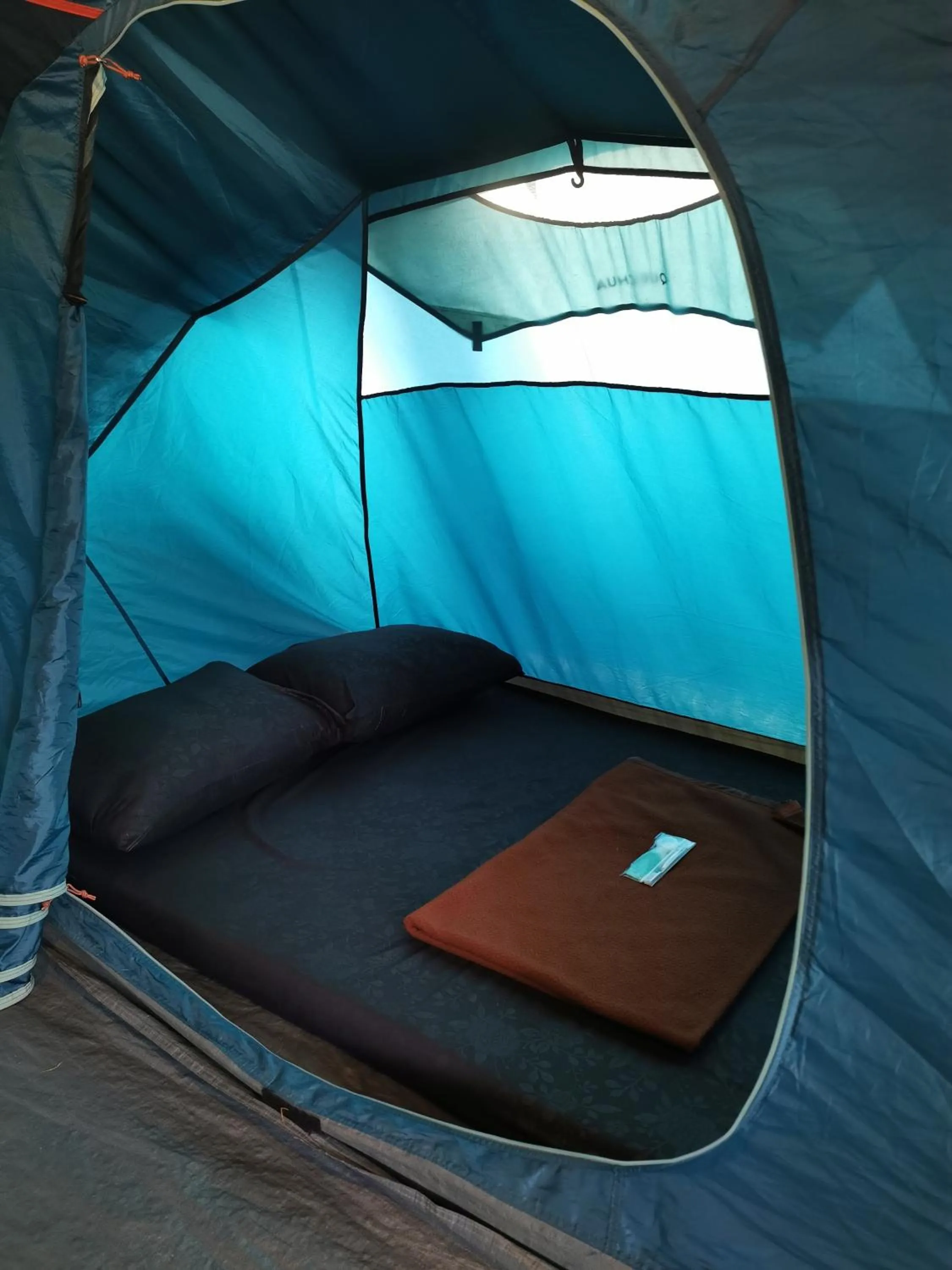 Bedroom in corak alam glamping