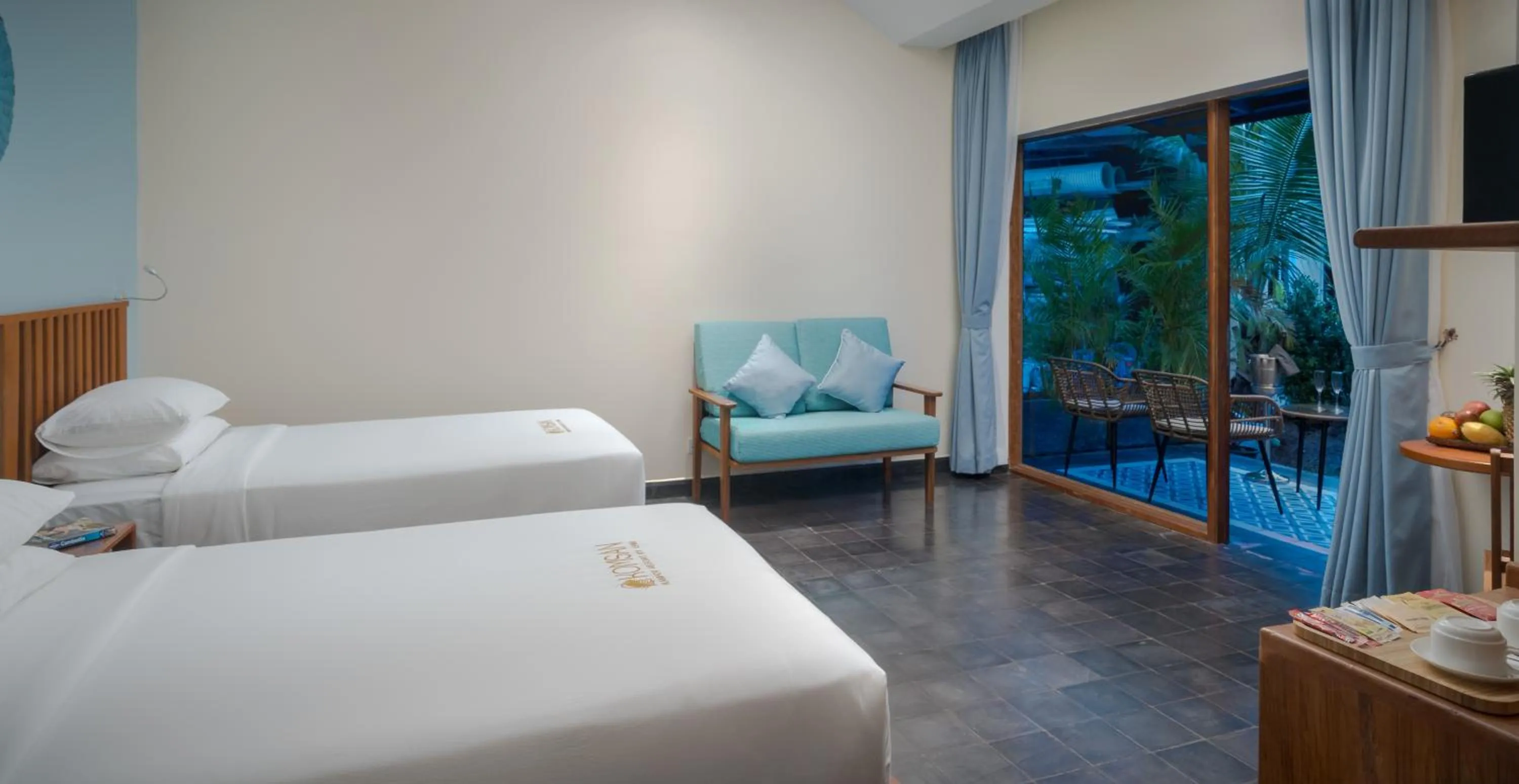 Bed in Komsan Kampot Resort