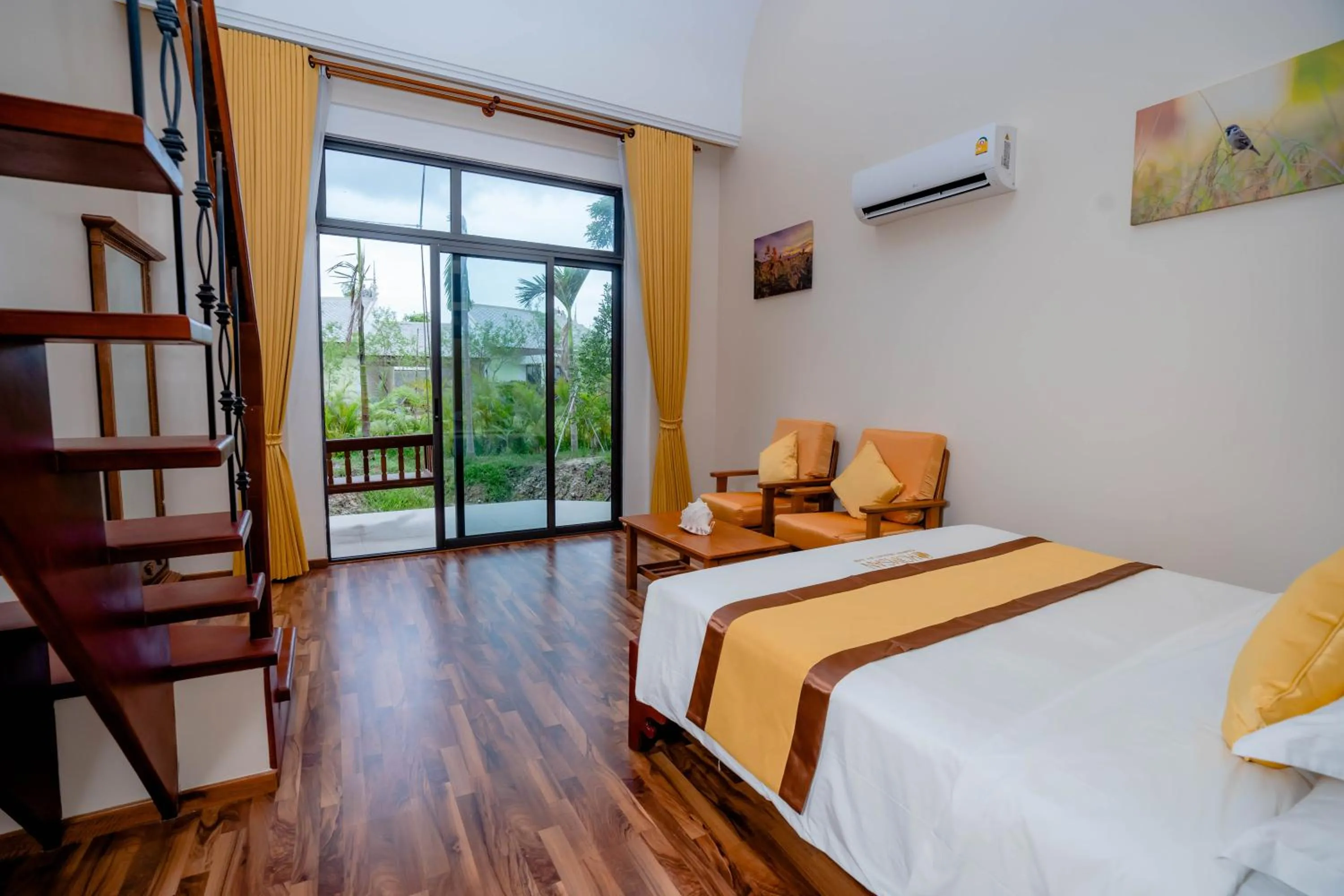 Bed in Komsan Kampot Resort