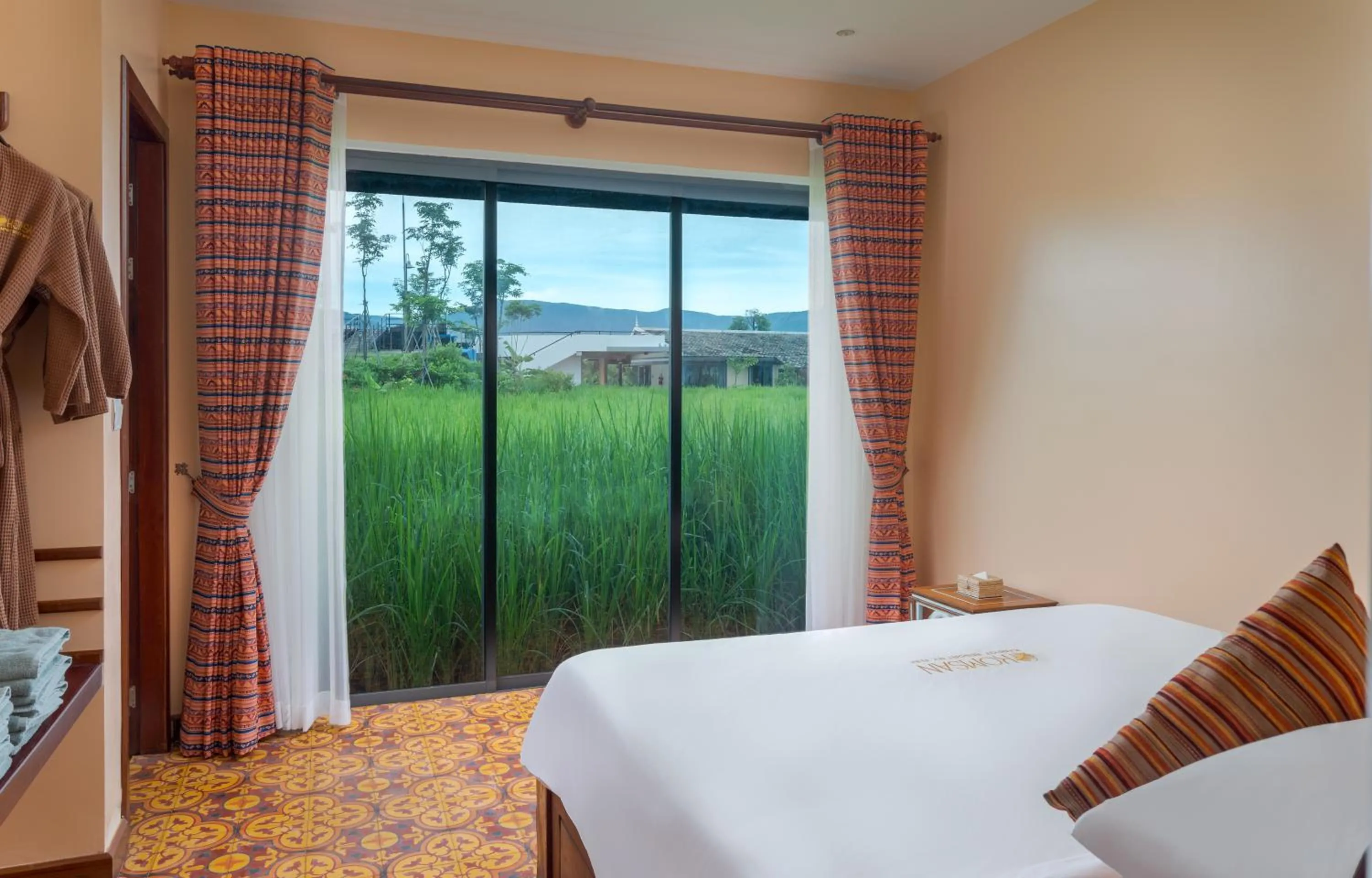 Bed in Komsan Kampot Resort