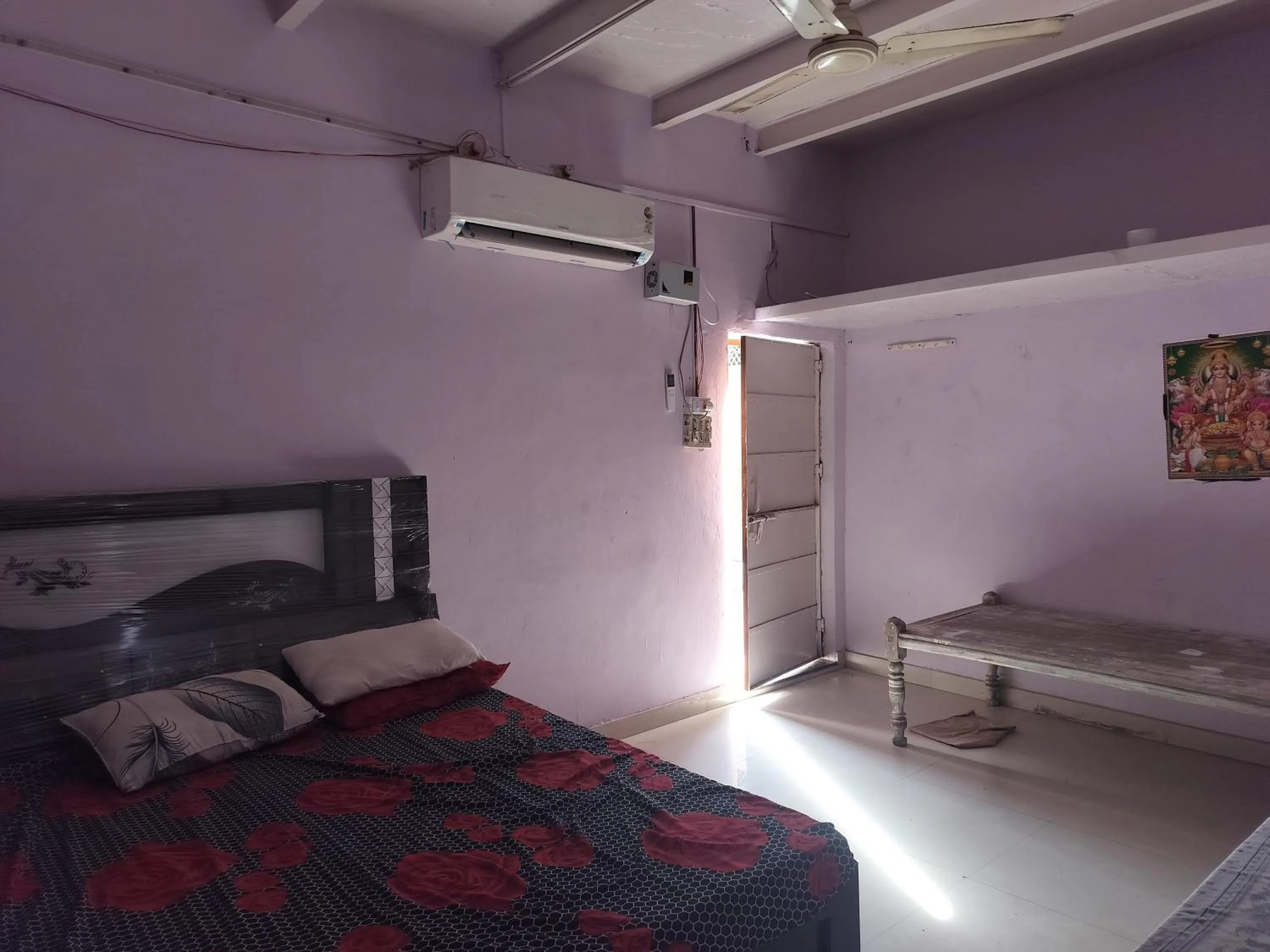 Bed in Shri Krishna Kunj homestay