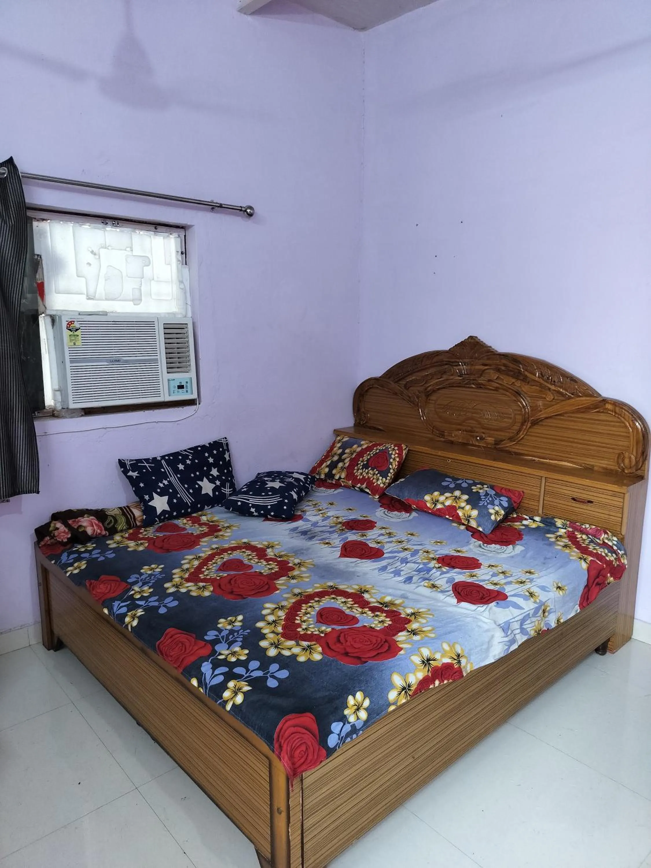 Bed in Shri Krishna Kunj homestay