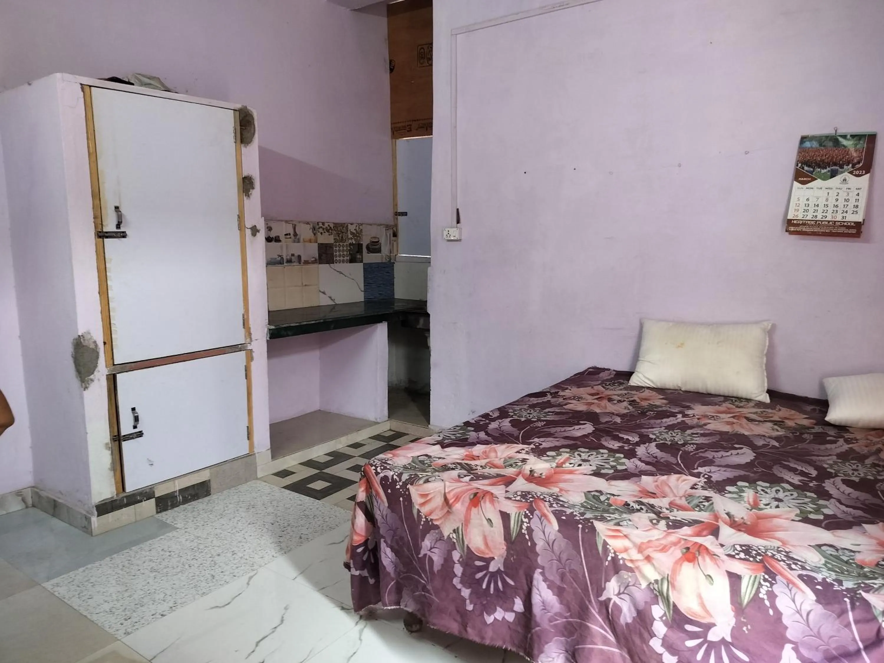 Bed in Shri Krishna Kunj homestay