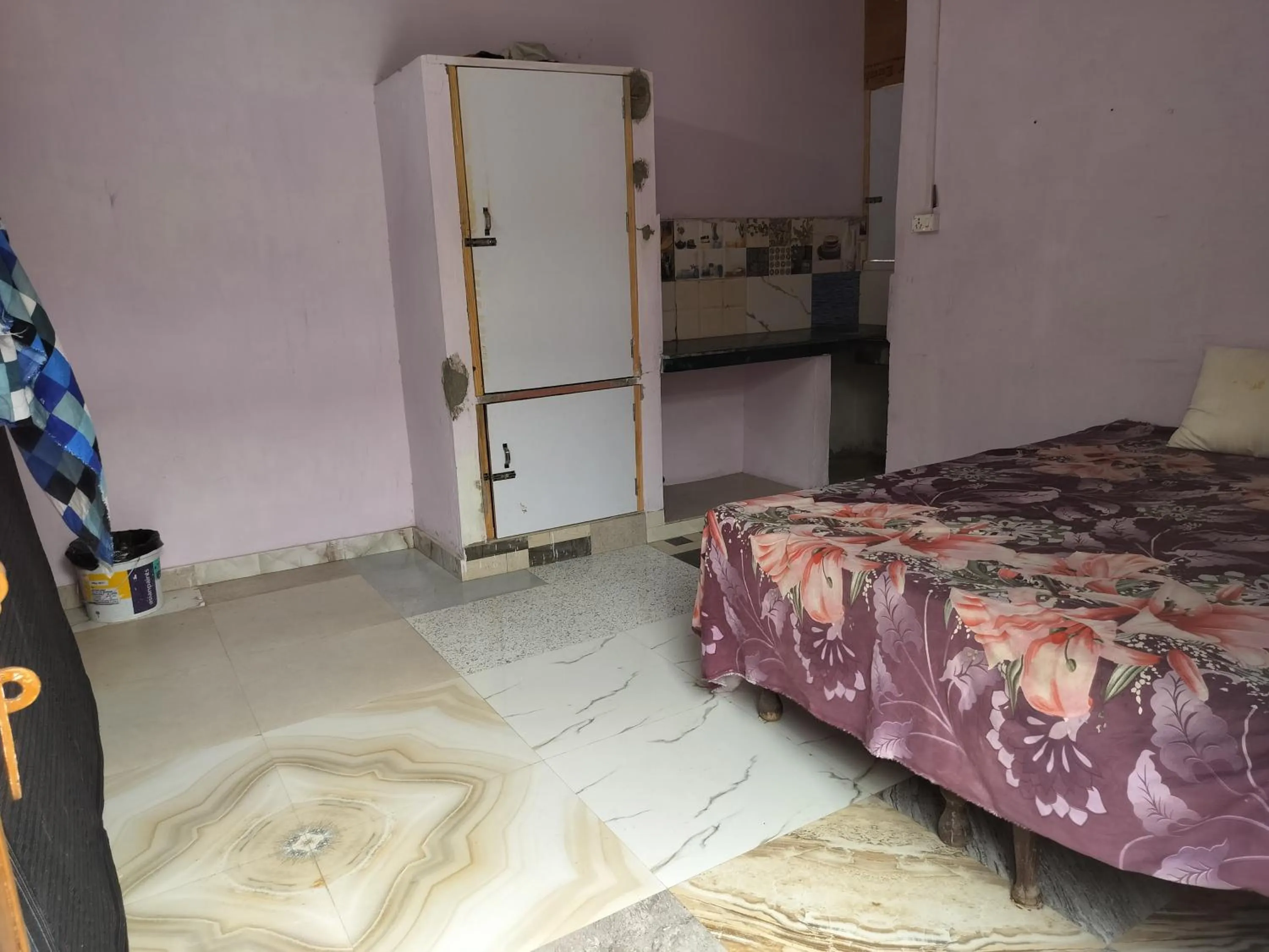 Bed in Shri Krishna Kunj homestay
