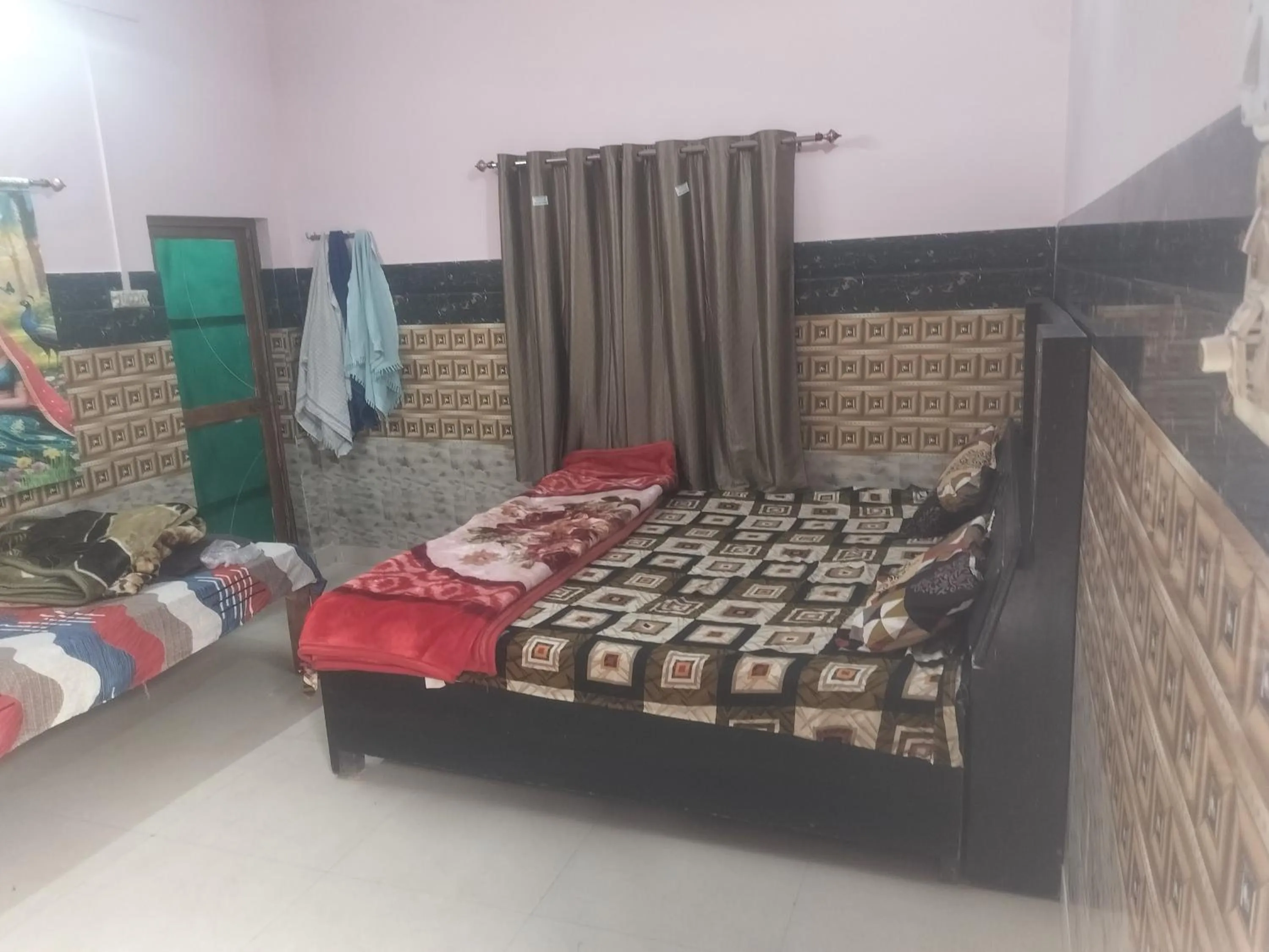 Bed in Shri Krishna Kunj homestay