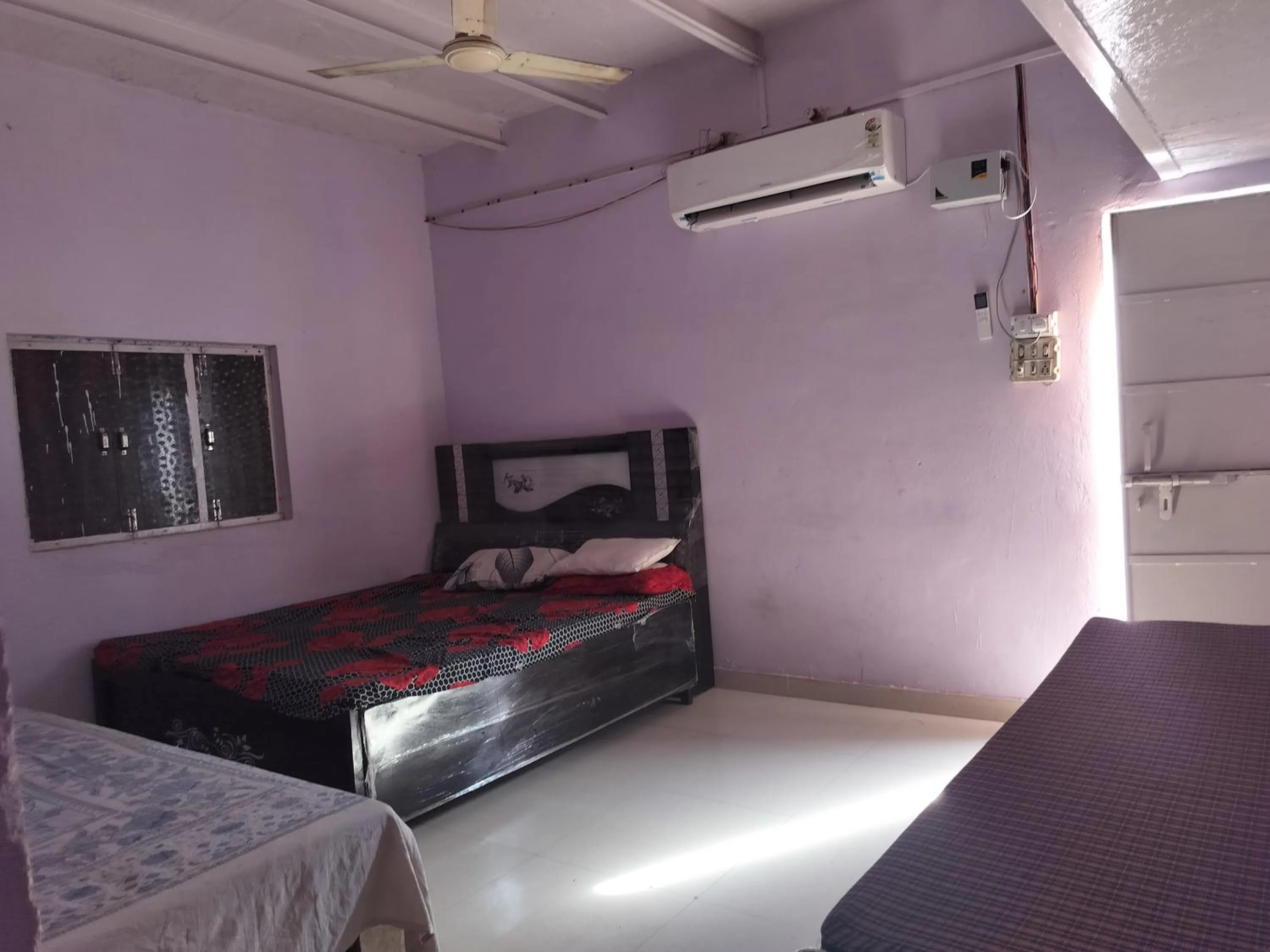 Bed in Shri Krishna Kunj homestay
