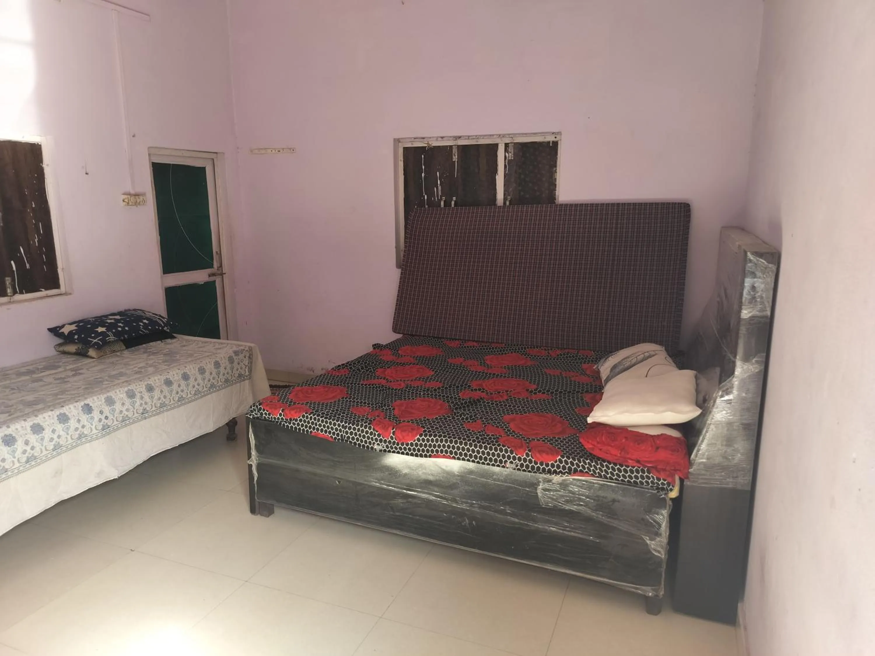 Bed in Shri Krishna Kunj homestay