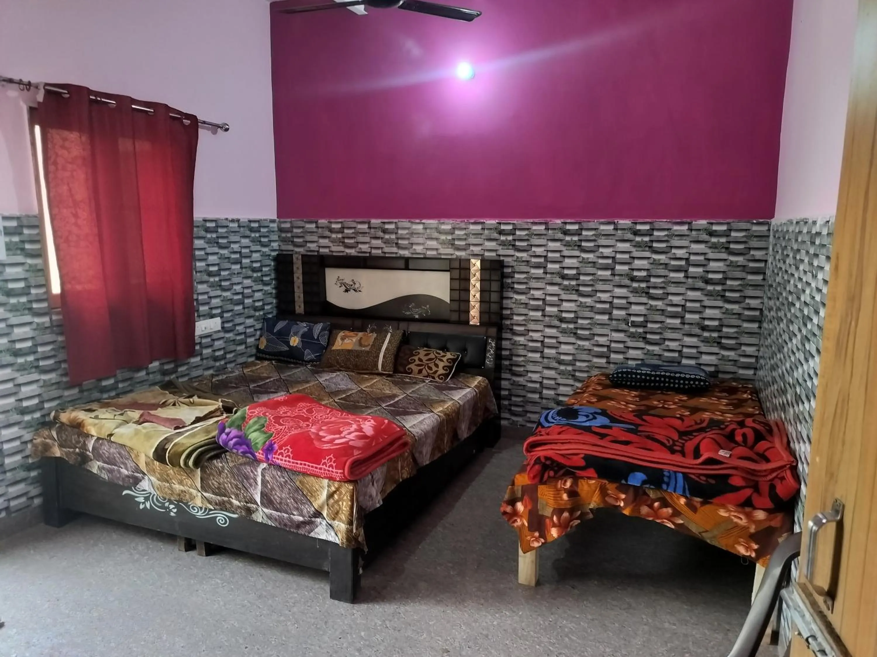 Bed in Shri Krishna Kunj homestay