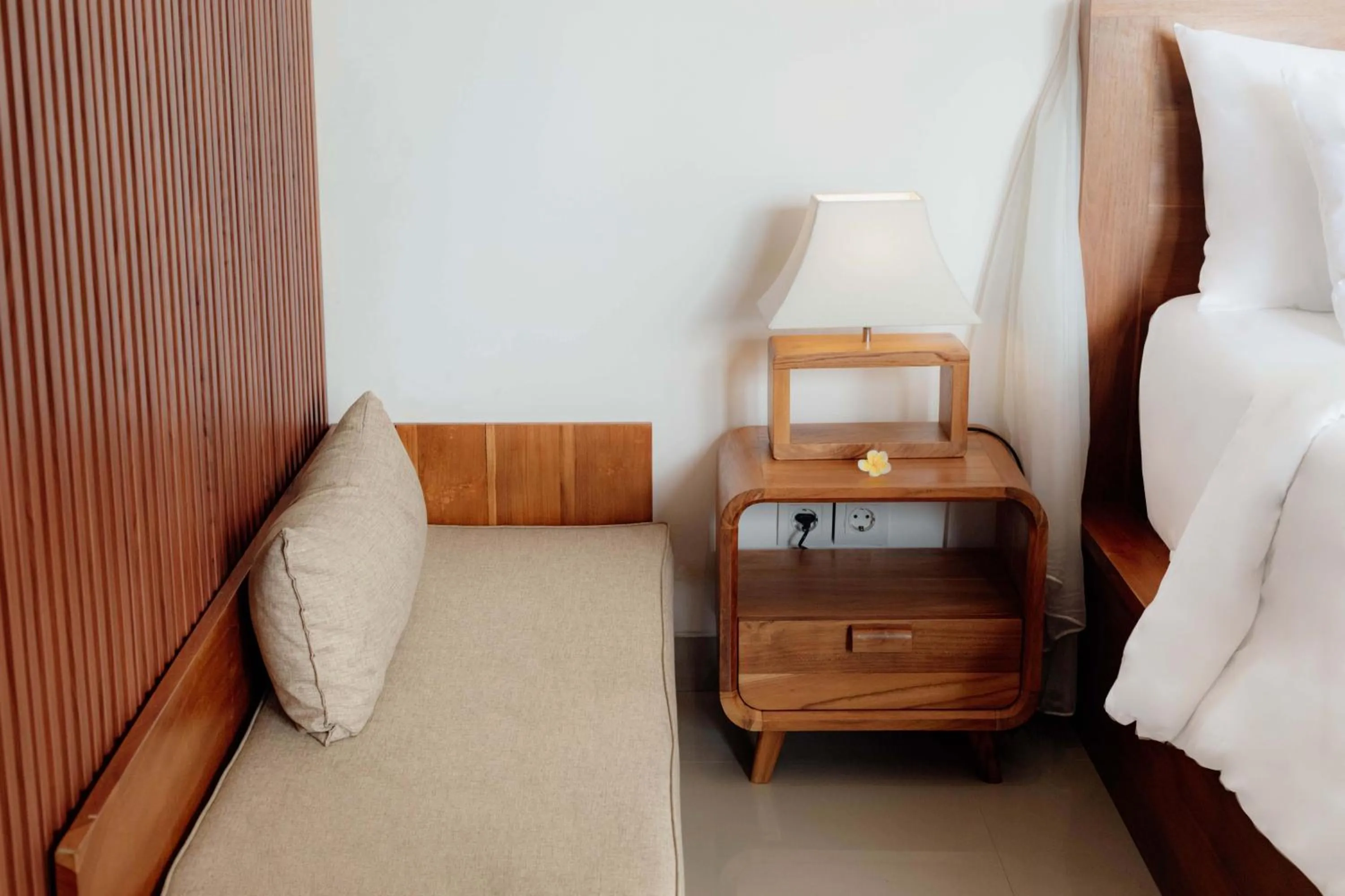 Seating area, Bed in Weda Villas