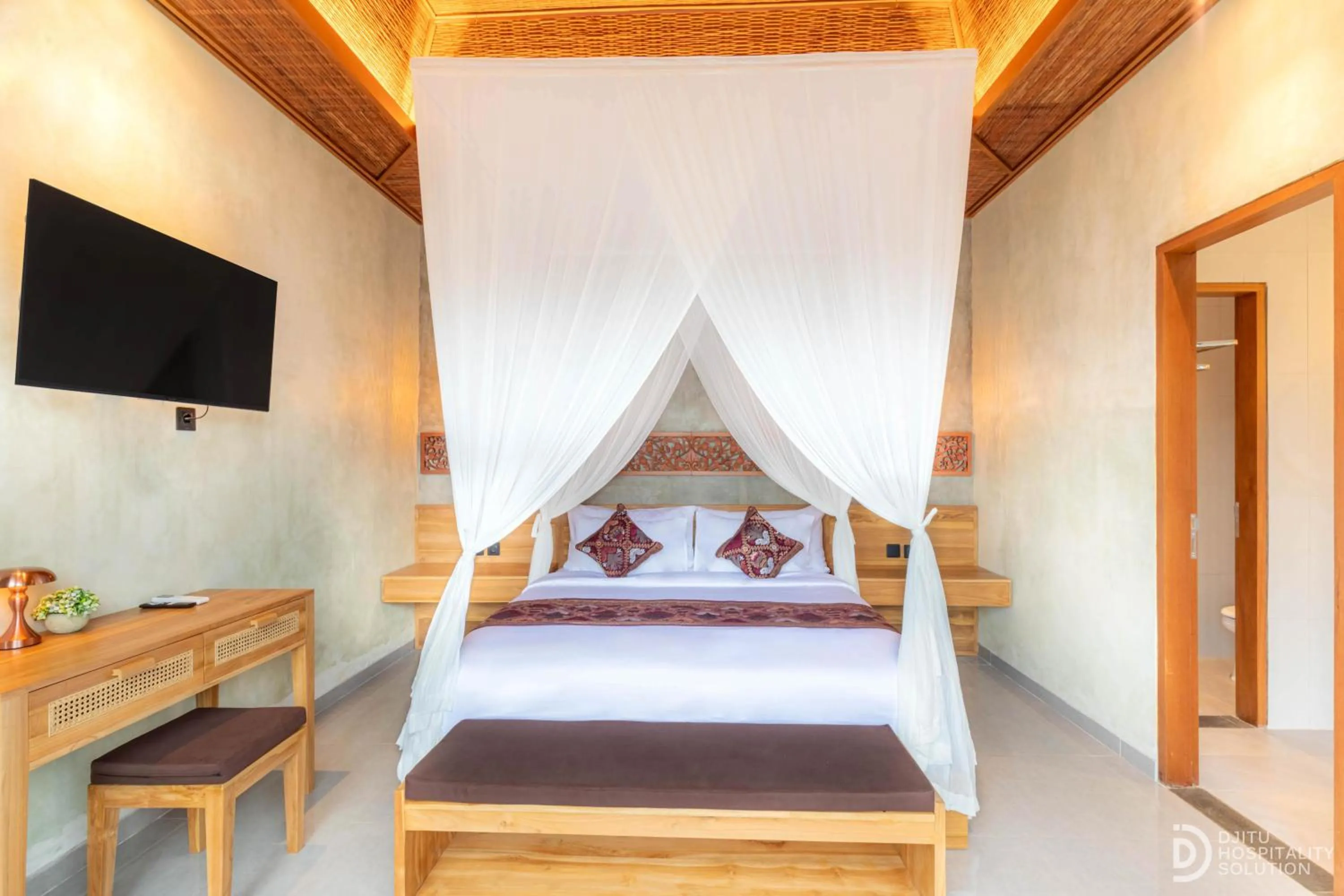 Bathroom, Bed in Weda Villas