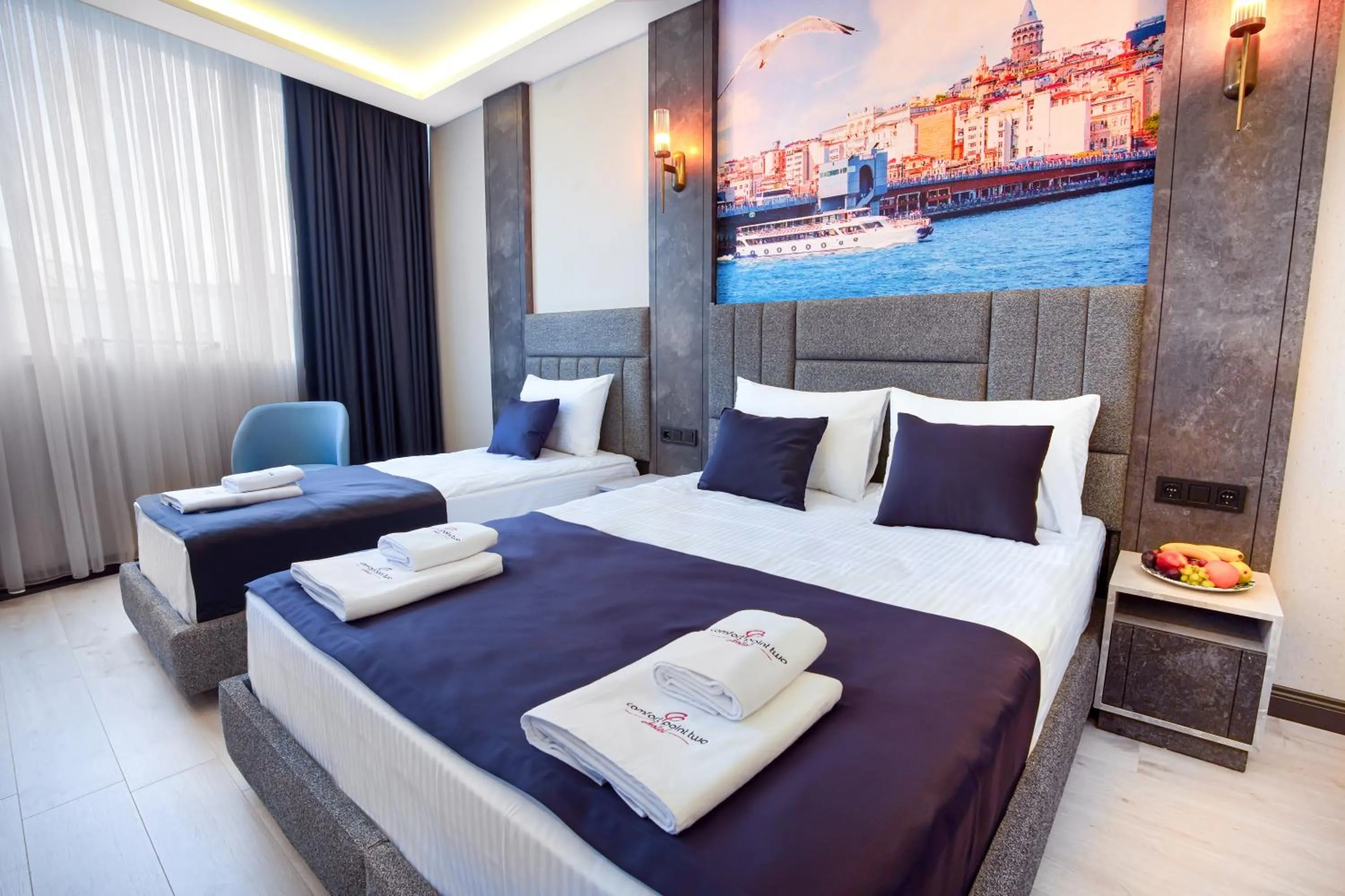 Bed in Comfort Point Two Hotel