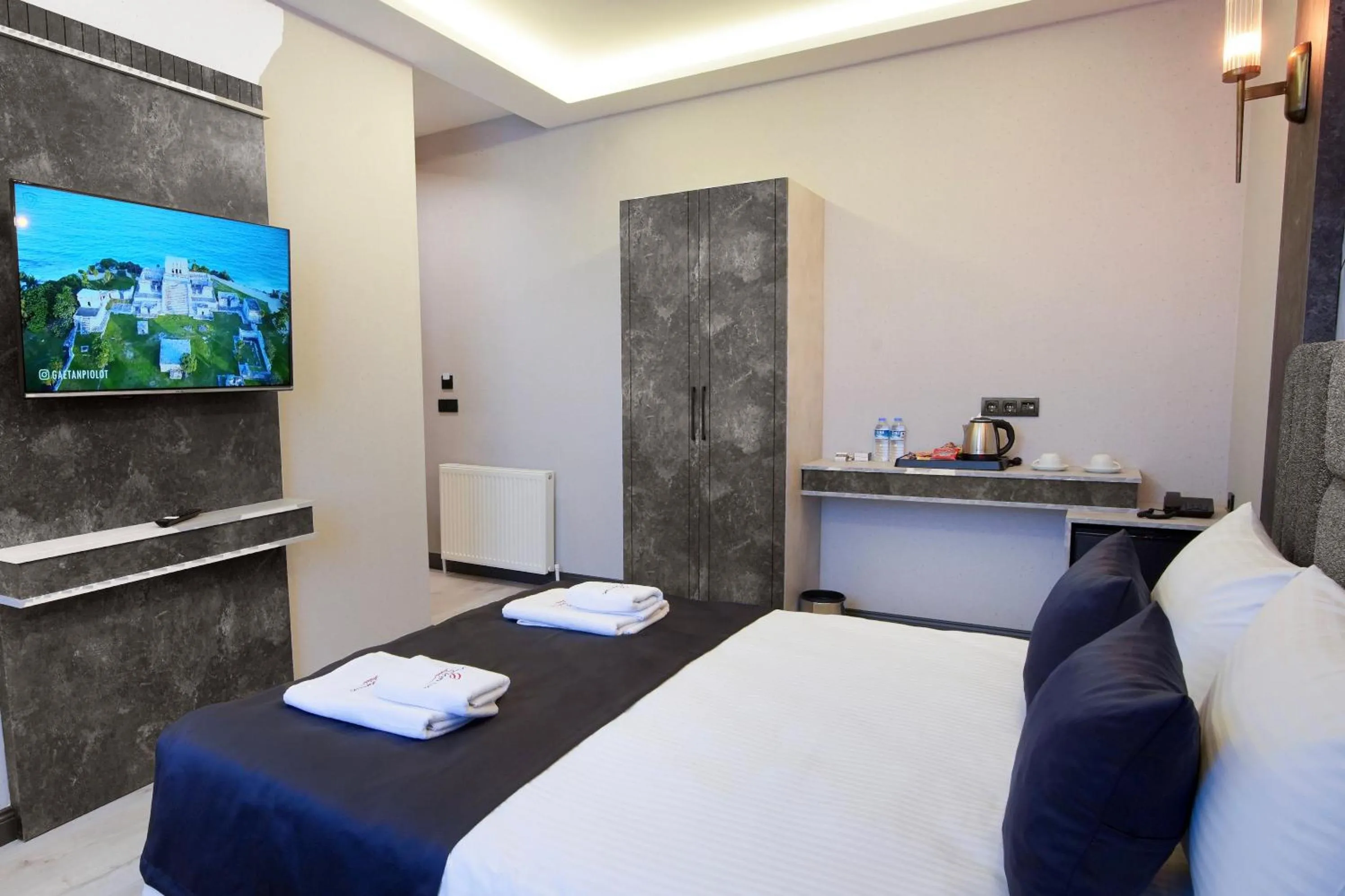 Bed in Comfort Point Two Hotel