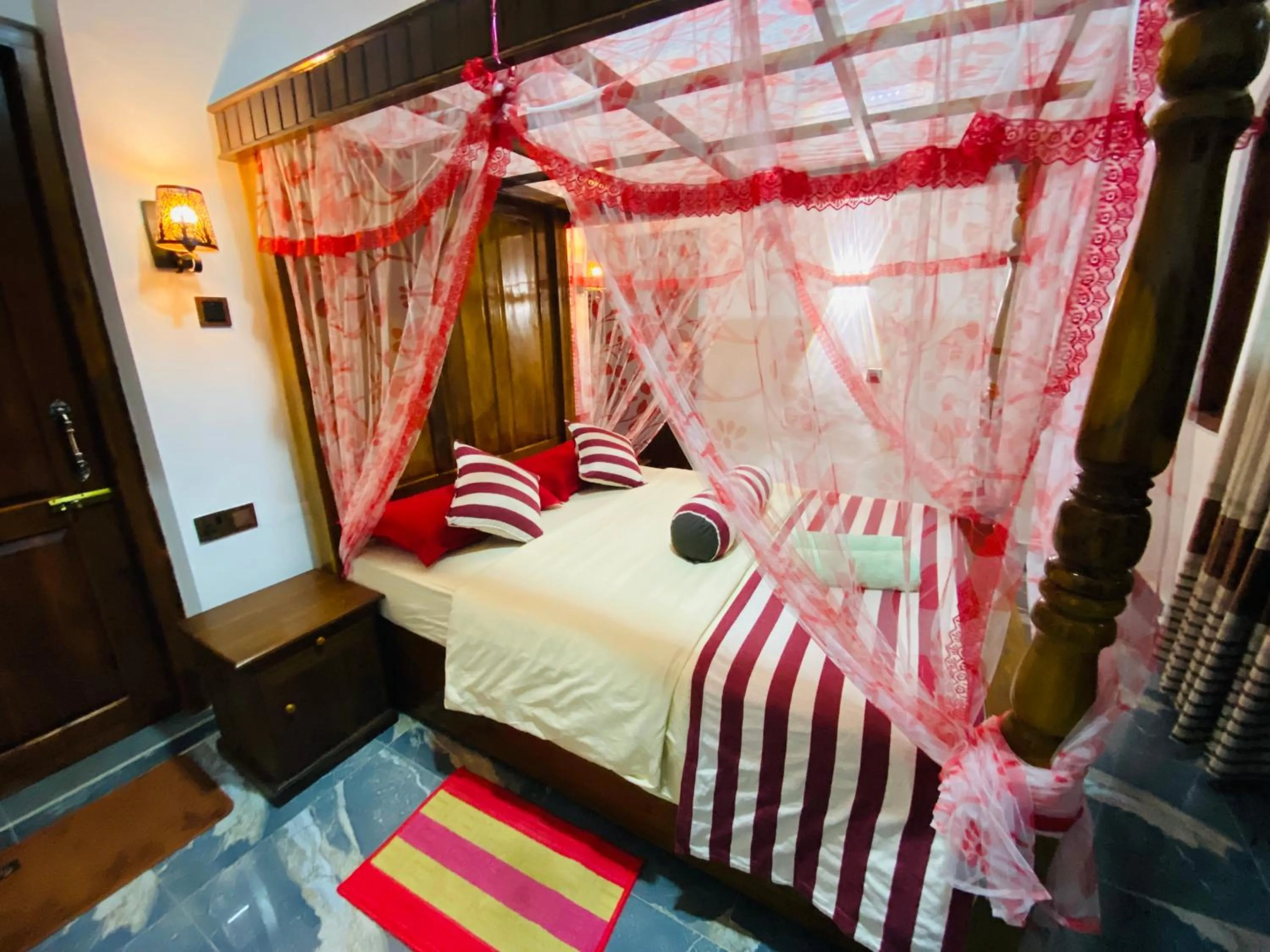 Bed in Madushanka Resort