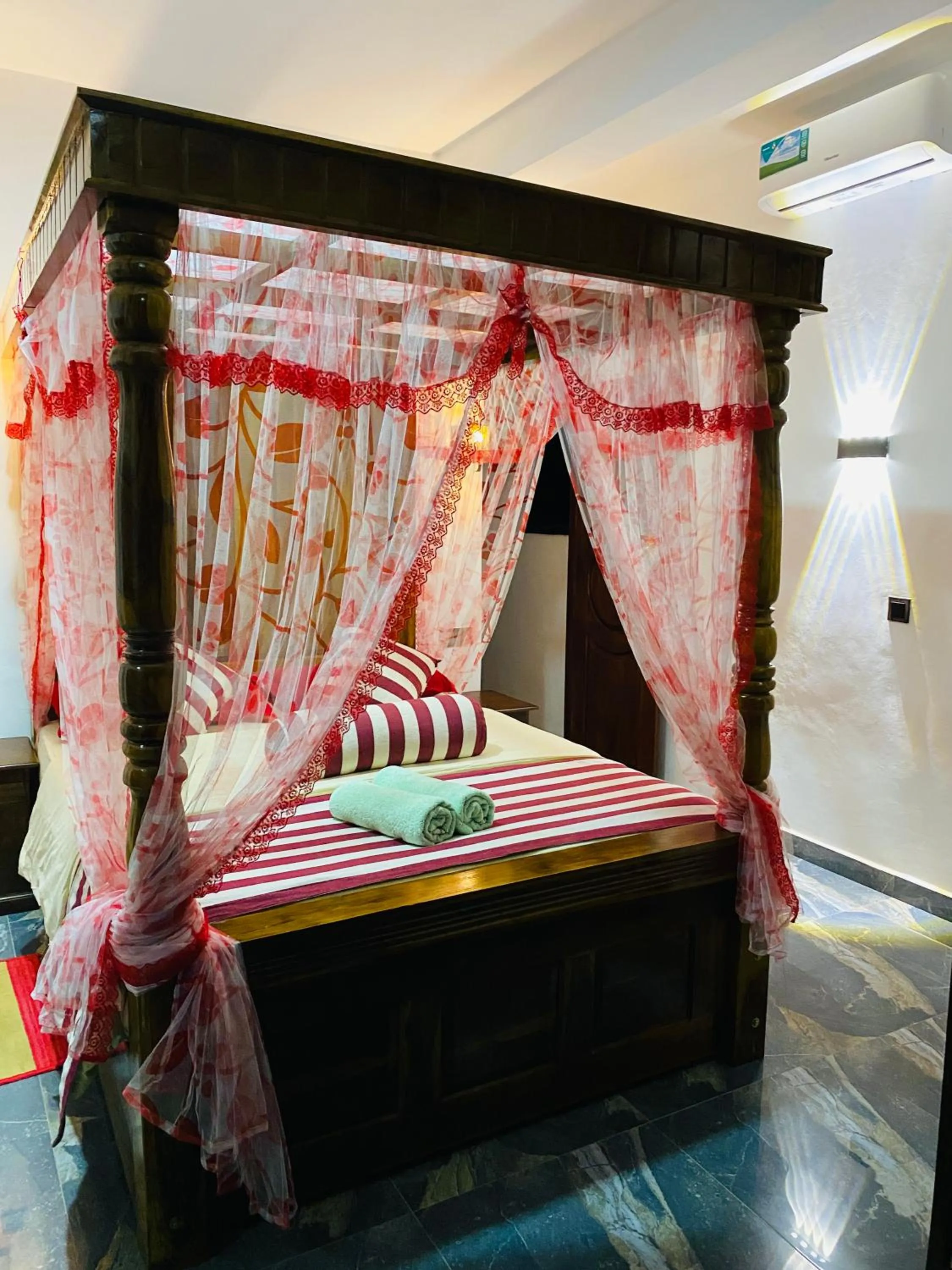 Bed in Madushanka Resort