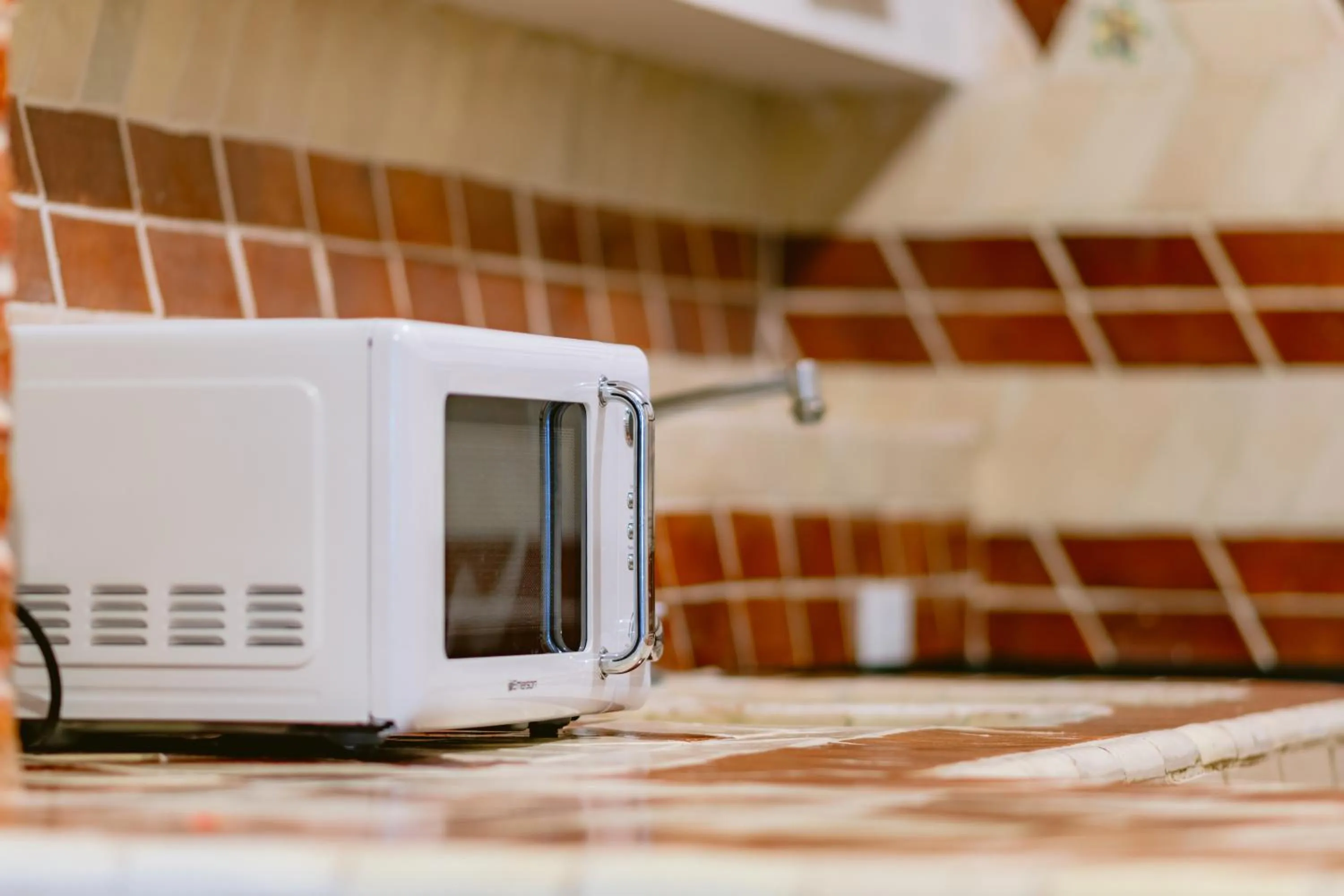 microwave in Te Amo Hotel Boutique