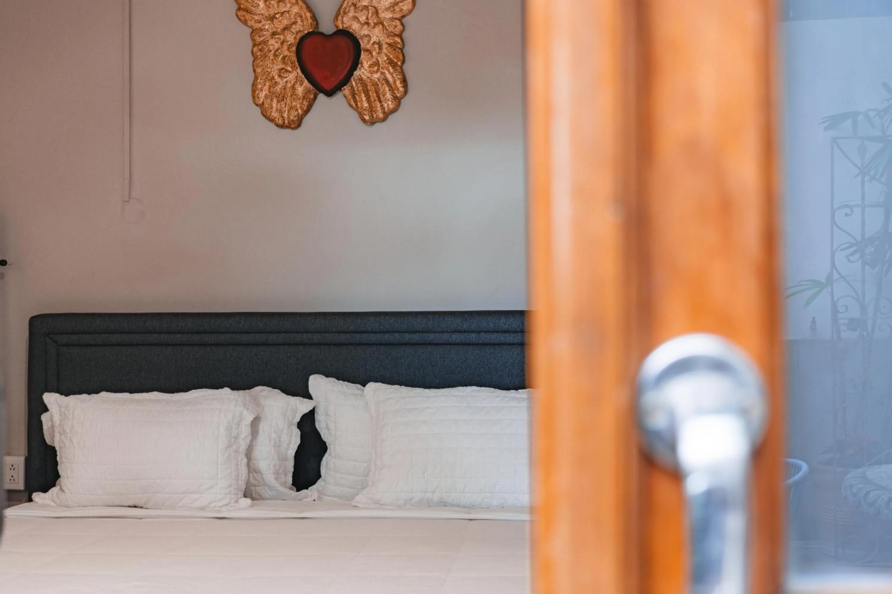 Decorative detail, Bed in Te Amo Hotel Boutique