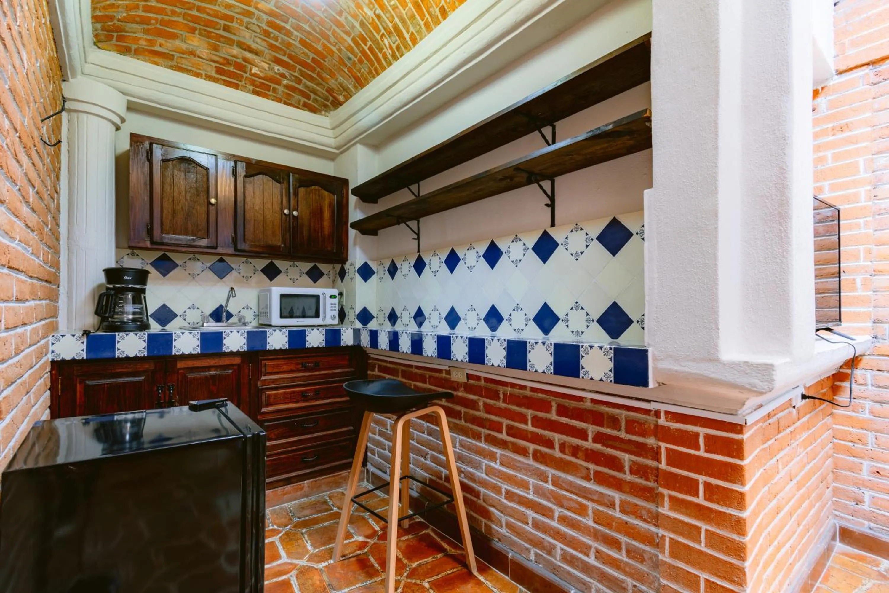 Kitchen or kitchenette in Te Amo Hotel Boutique